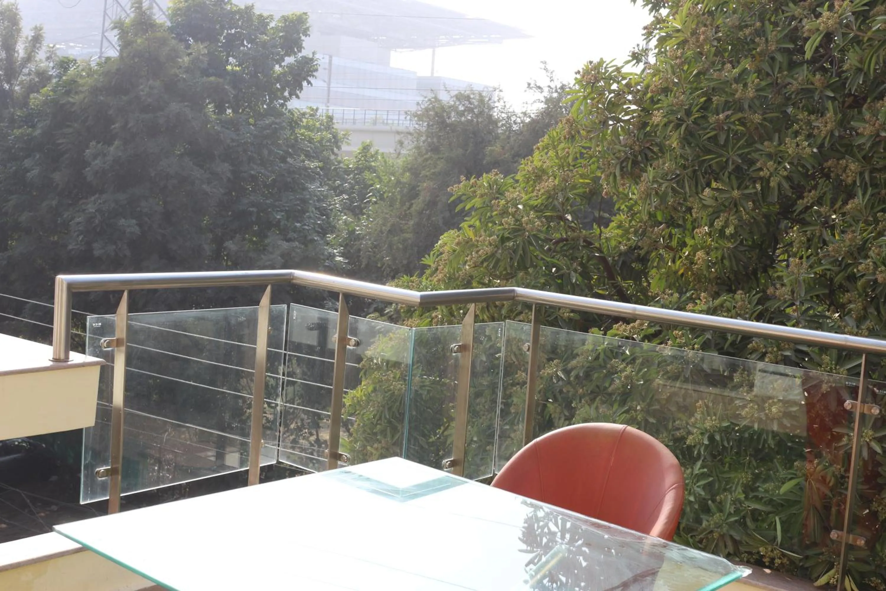 Balcony/Terrace in Lime Tree Hotel Sushant Lok Gurgaon Sector 29 Next to IFFCO CHOWK metro