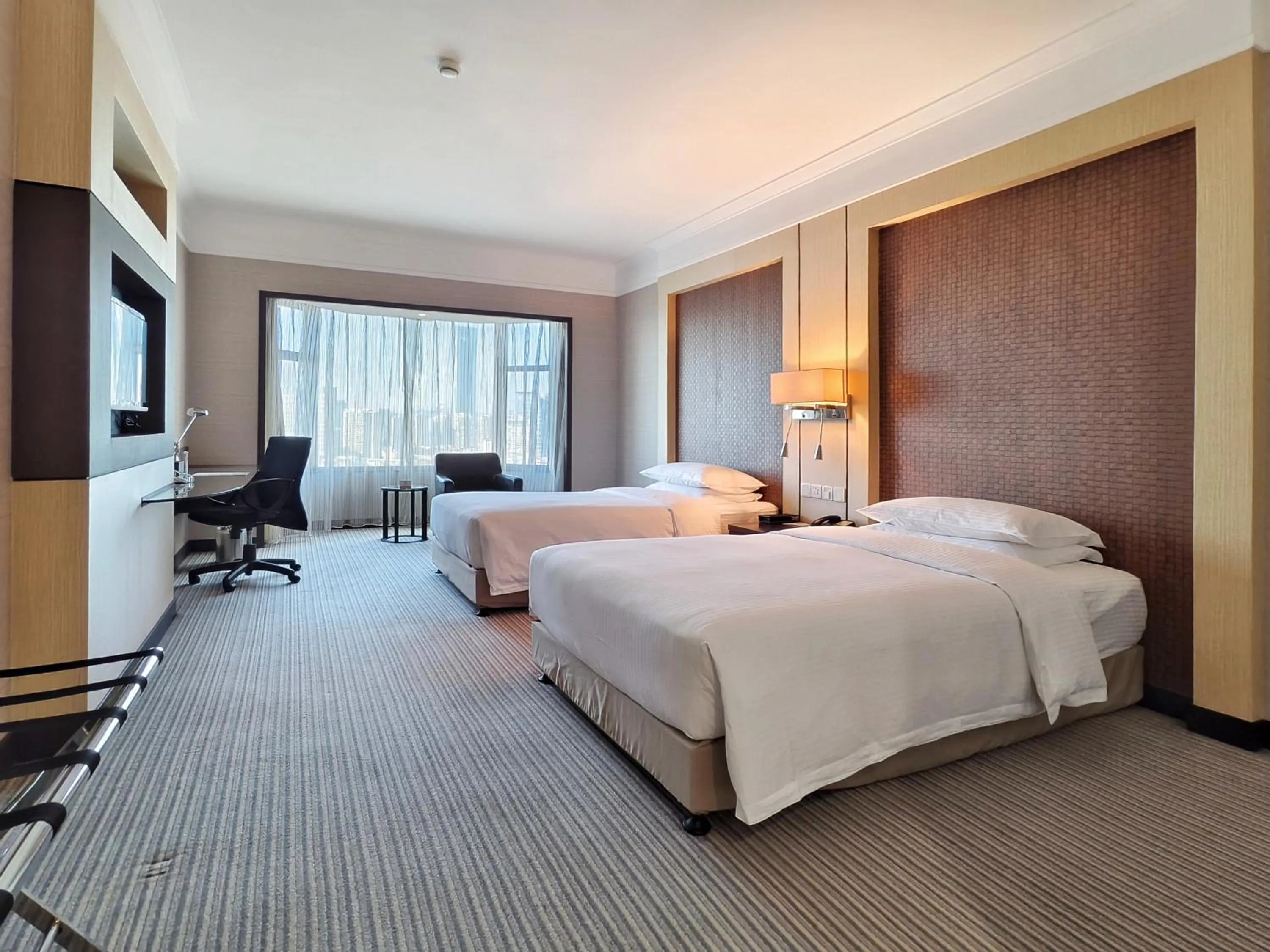 Photo of the whole room, Bed in Millennium Harbourview Hotel Xiamen