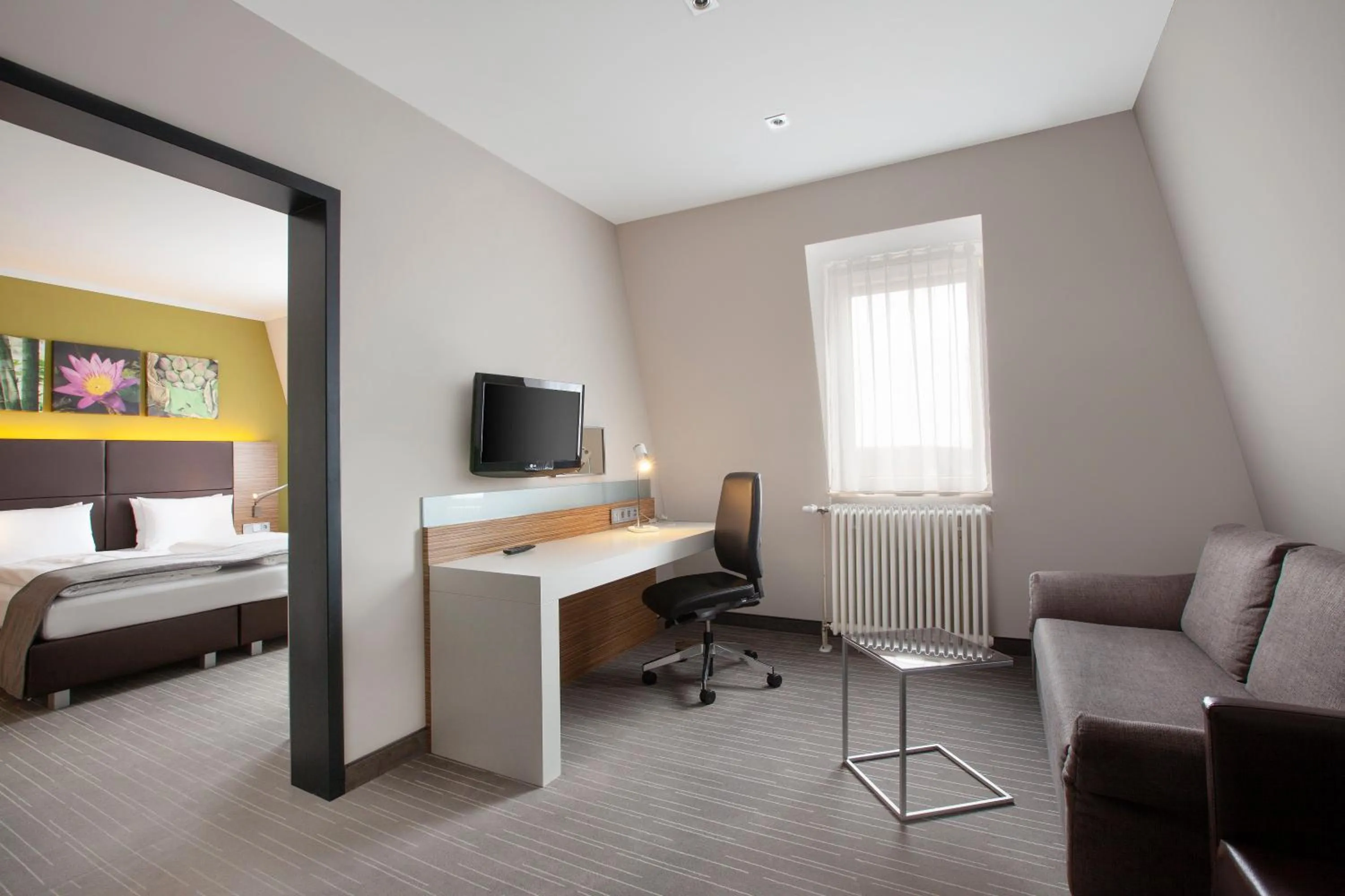 Photo of the whole room, Bed in Holiday Inn Leipzig Günthersdorf