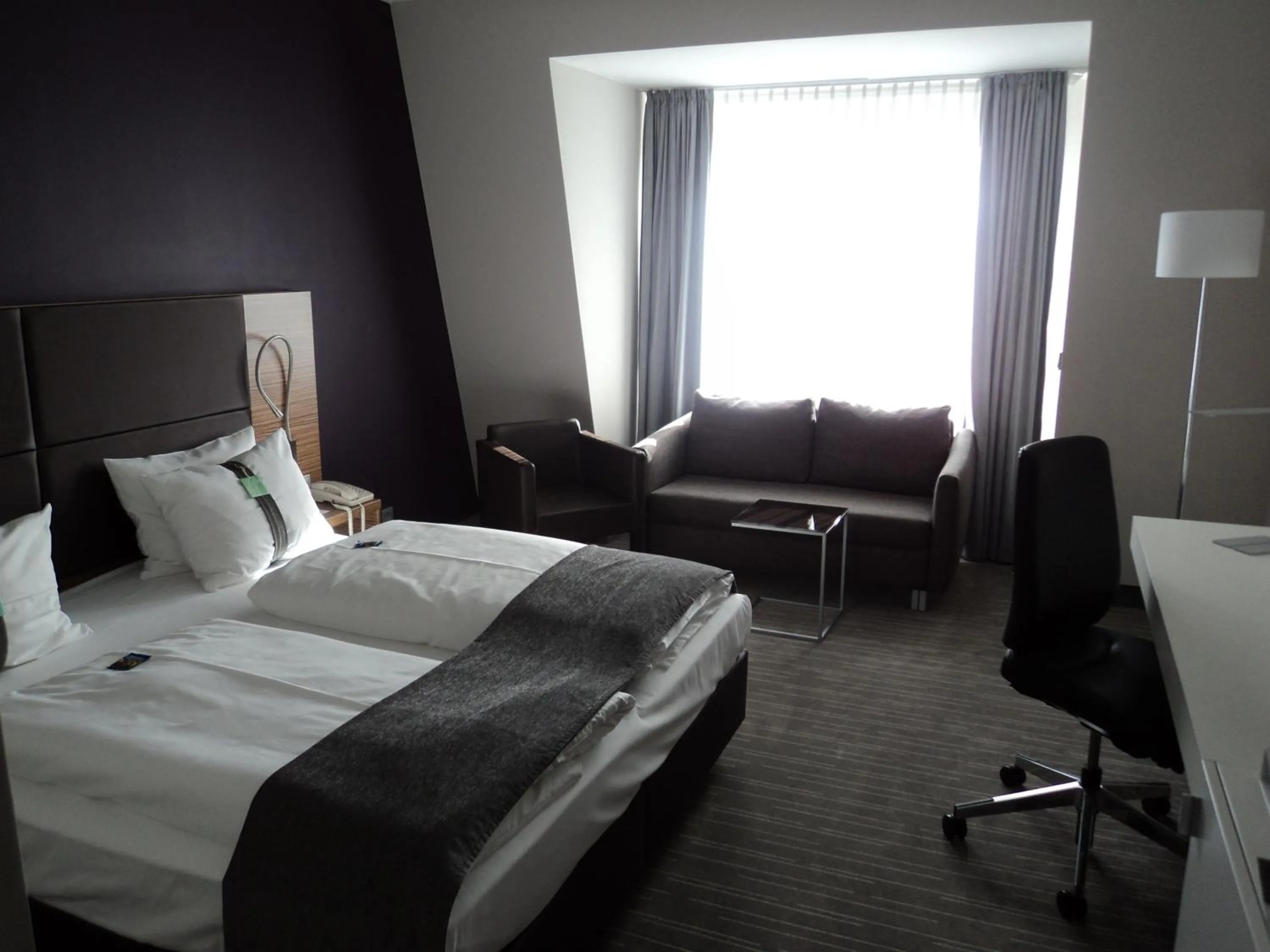 Photo of the whole room, Bed in Holiday Inn Leipzig Günthersdorf
