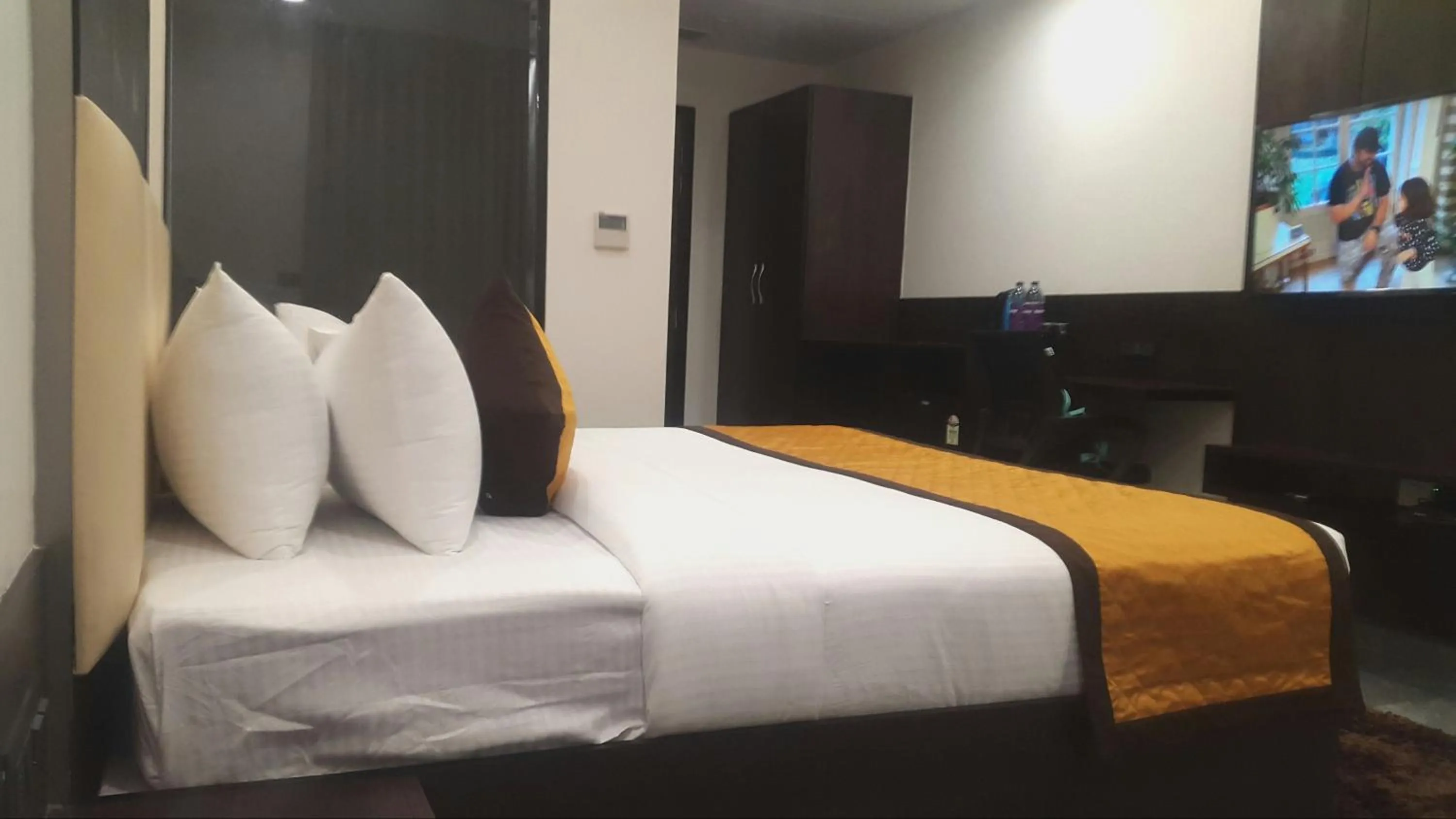 Photo of the whole room, Bed in Hotel Aksh Inn