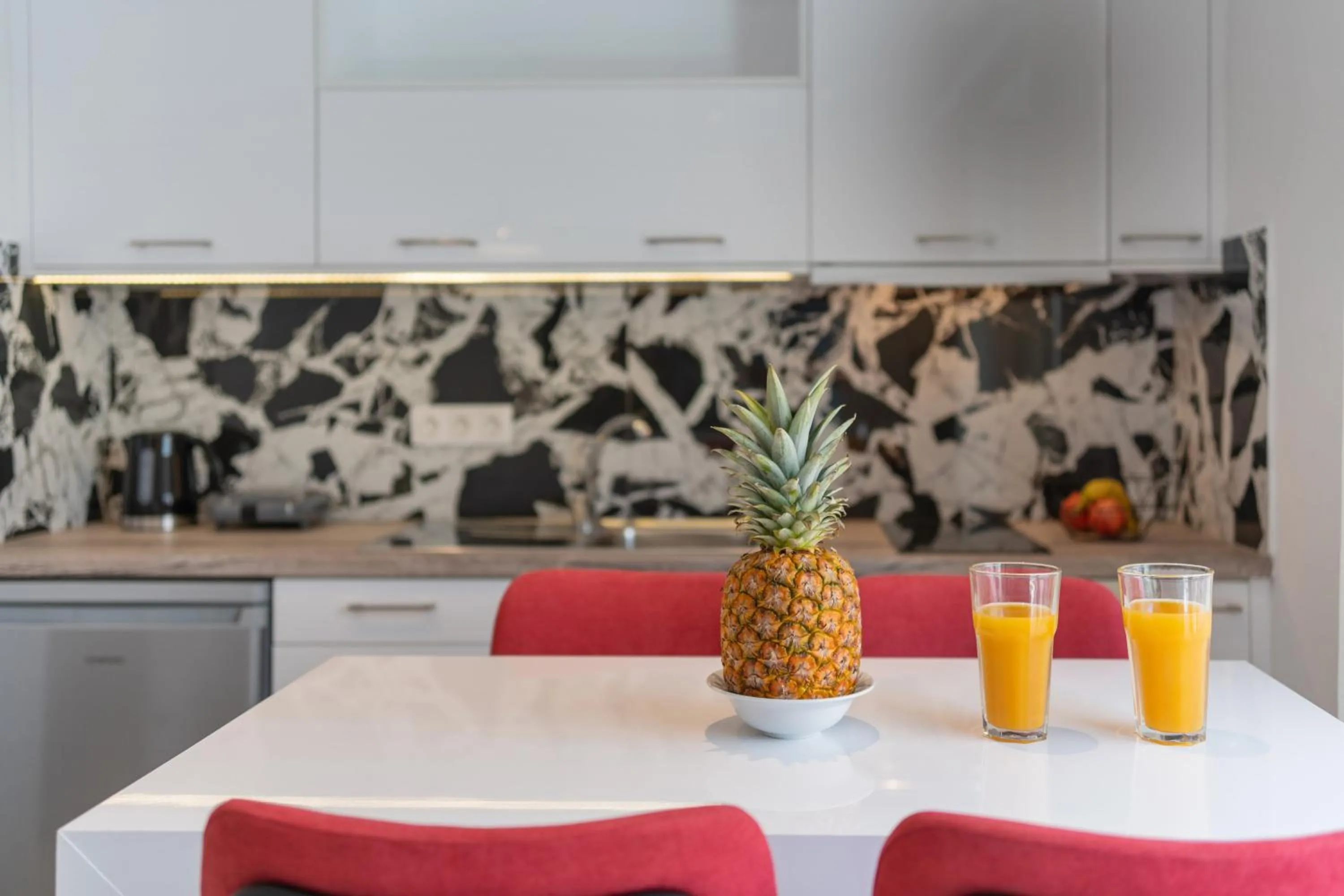 Kitchen or kitchenette in City and Sand Suites