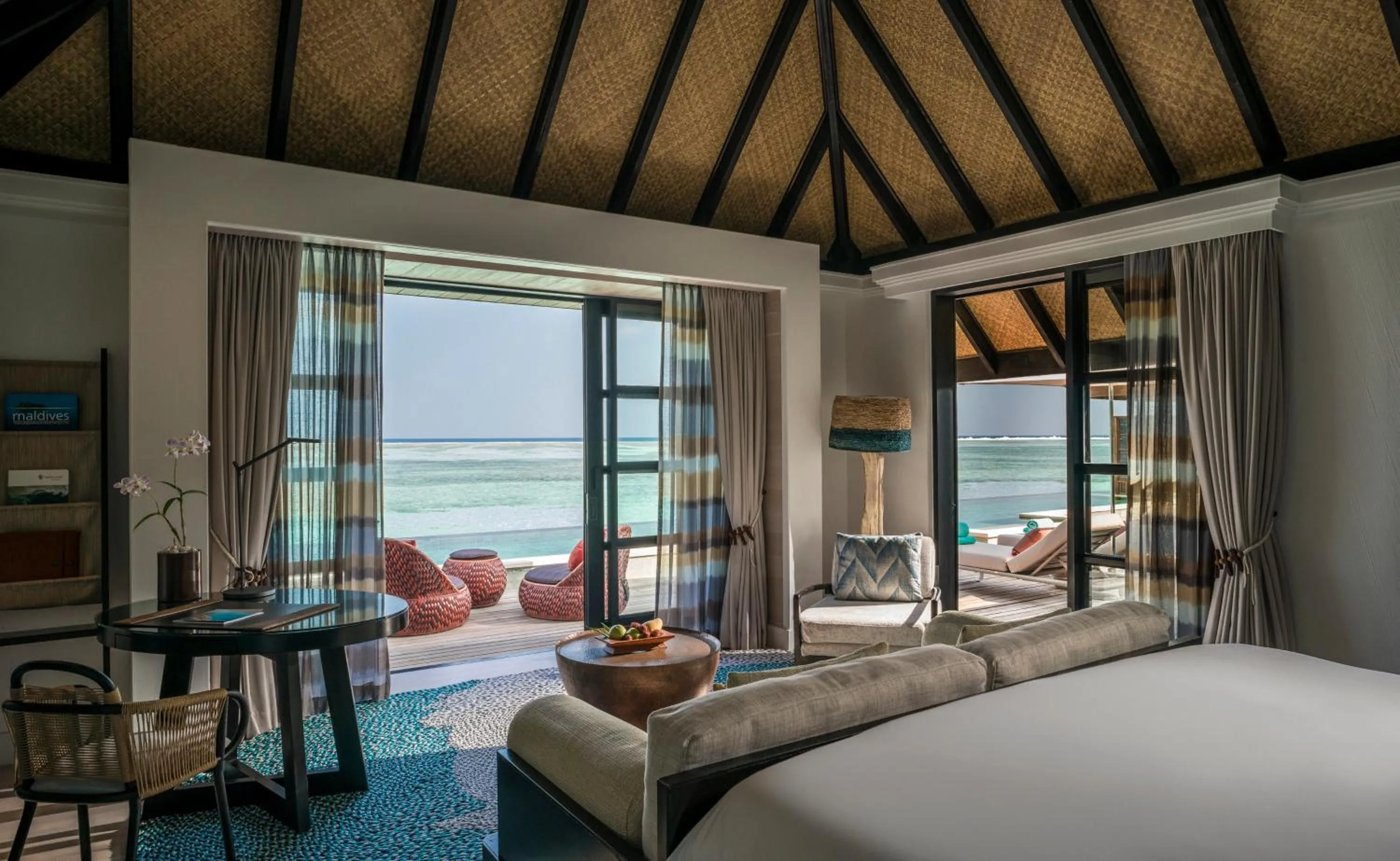 Bed in Four Seasons Resort Maldives at Kuda Huraa