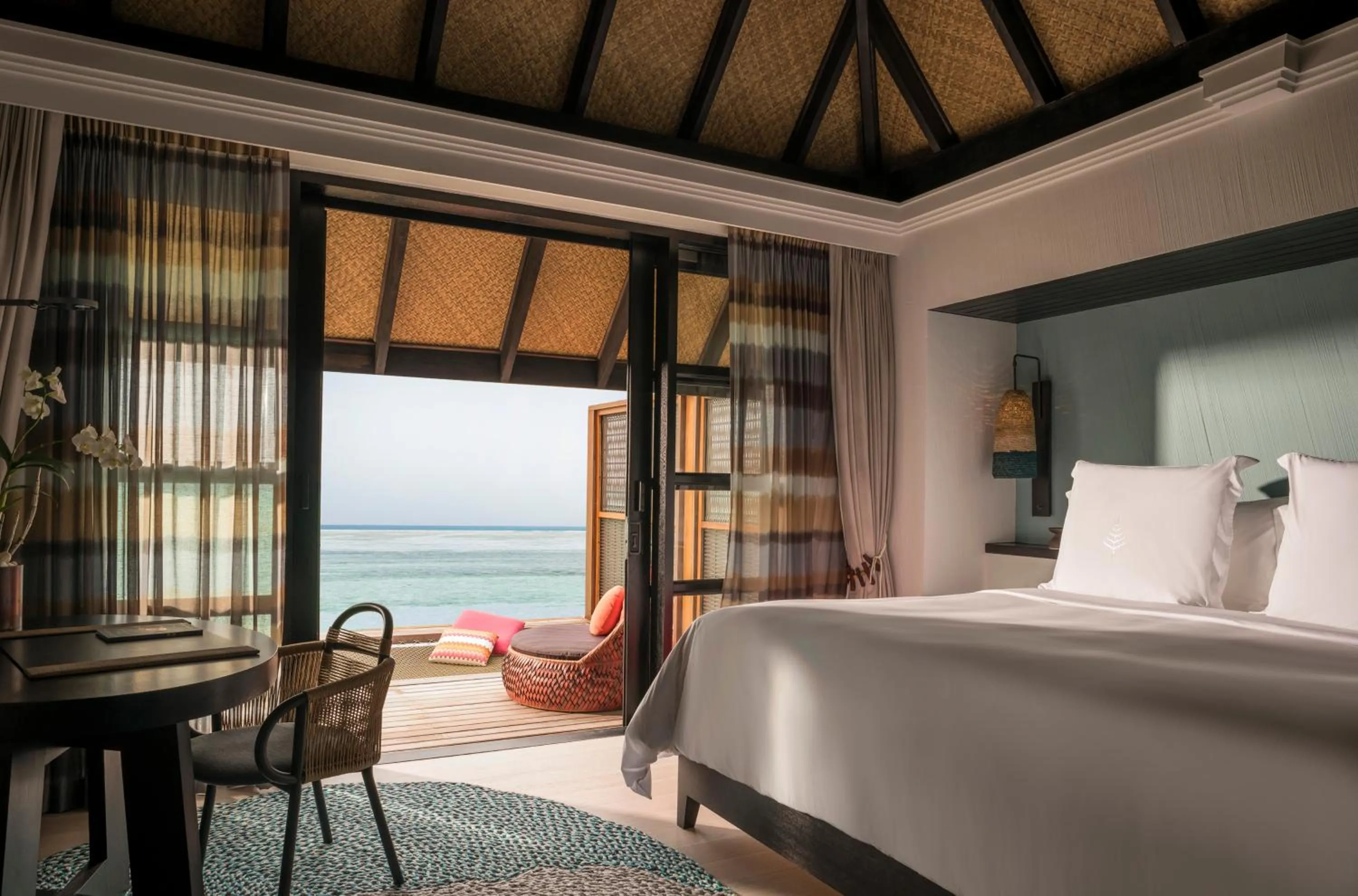 Bed in Four Seasons Resort Maldives at Kuda Huraa