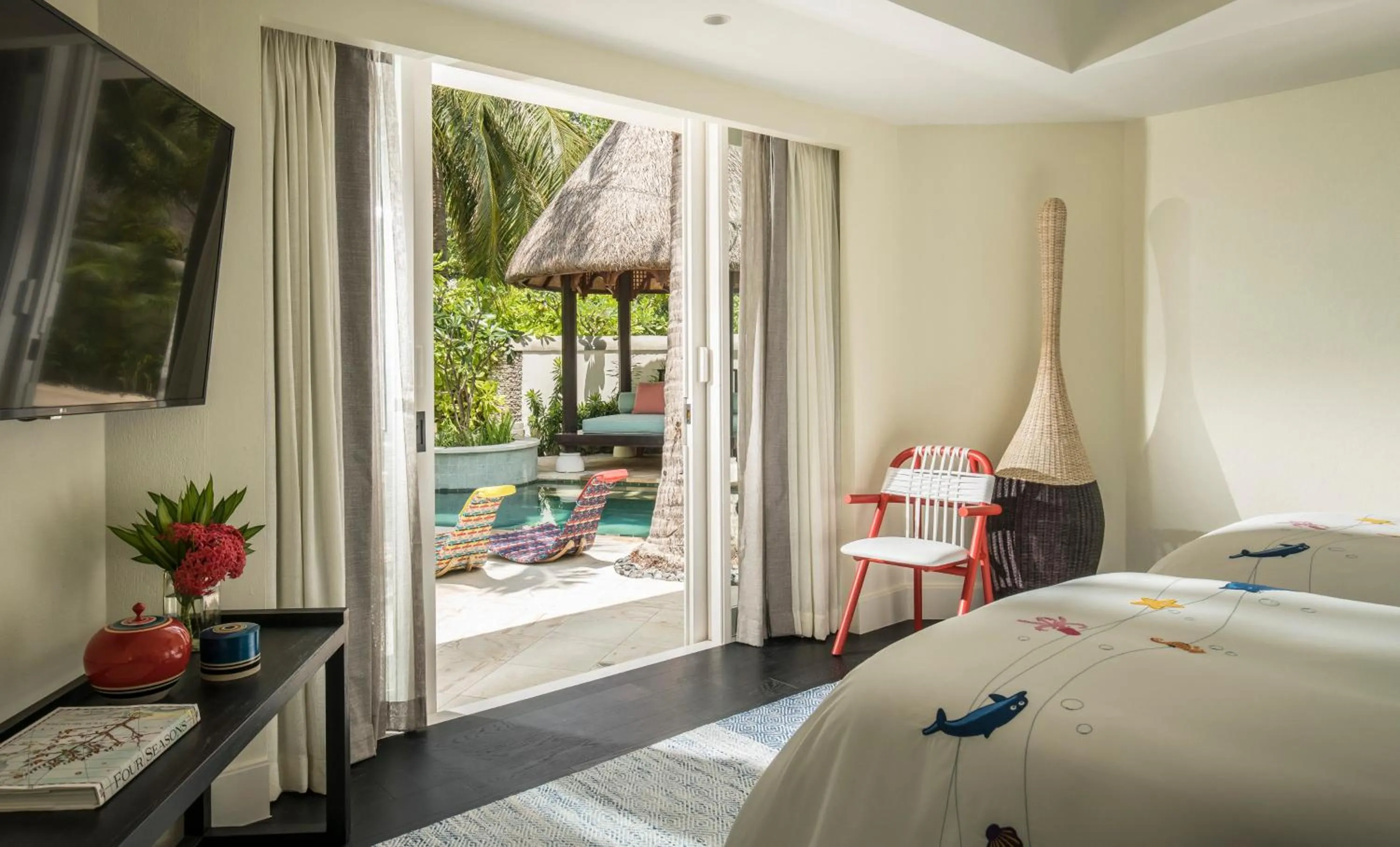 Bed in Four Seasons Resort Maldives at Kuda Huraa