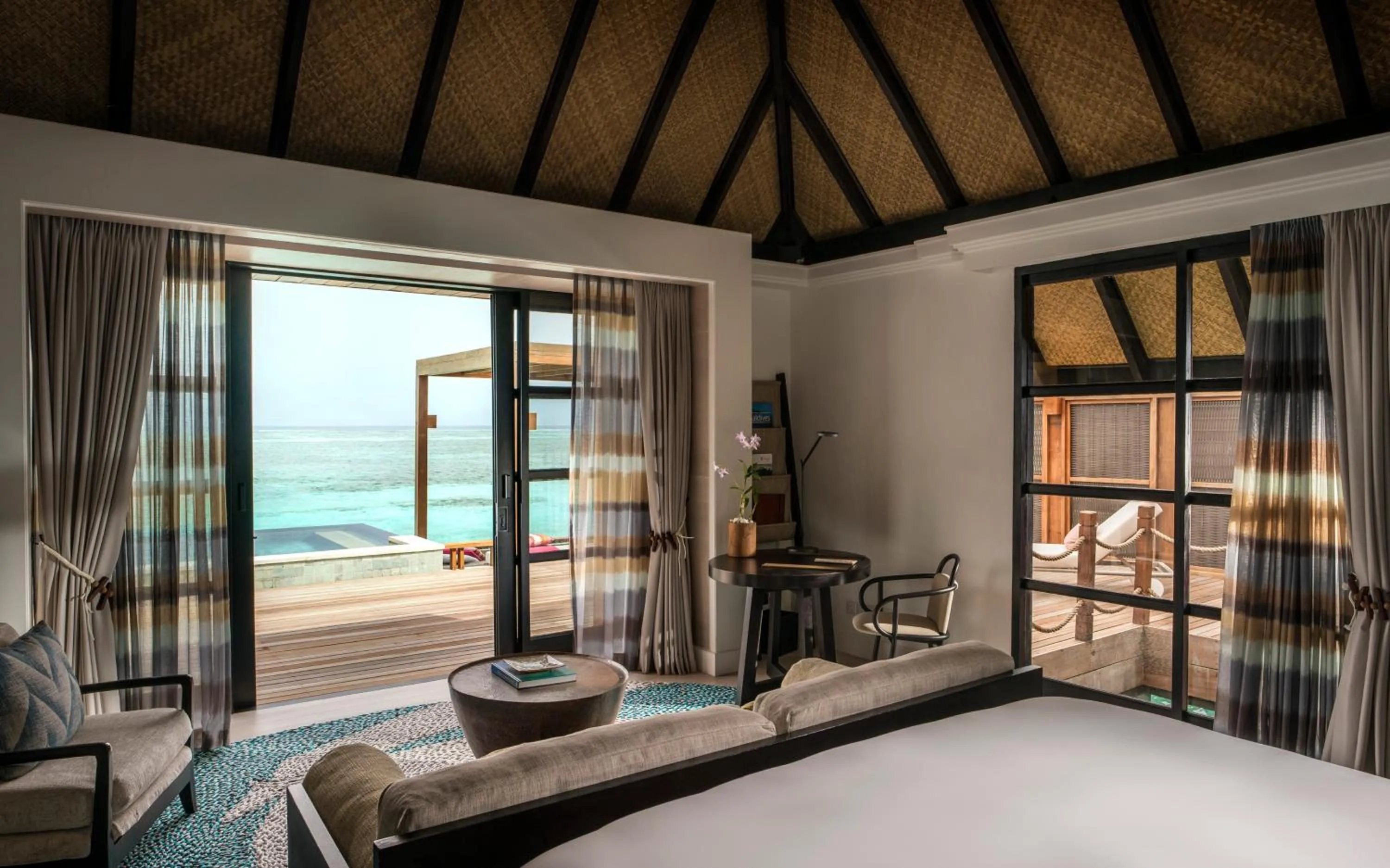 Bed in Four Seasons Resort Maldives at Kuda Huraa