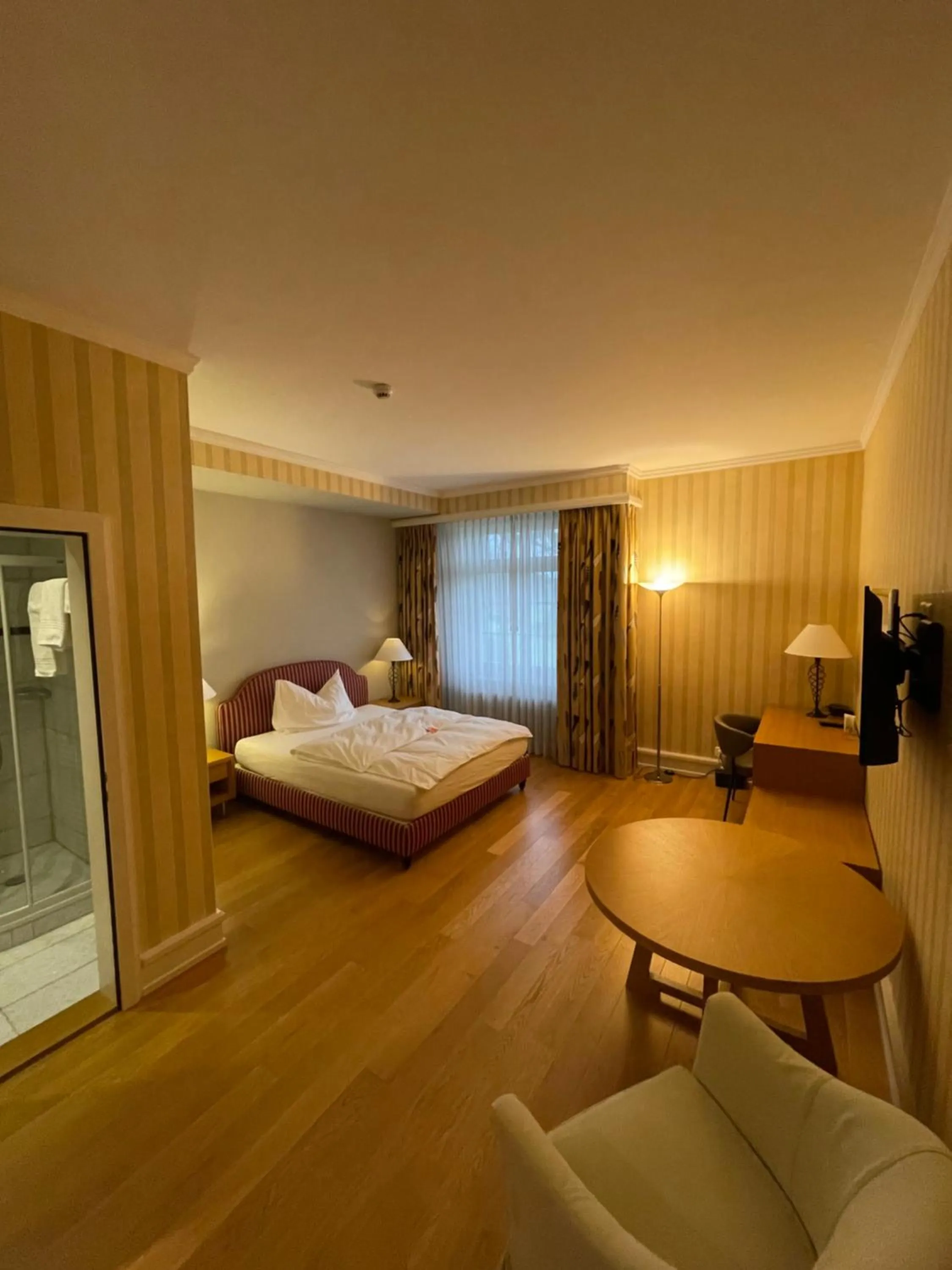 Seating area, Bed in Parkforum Wylihof