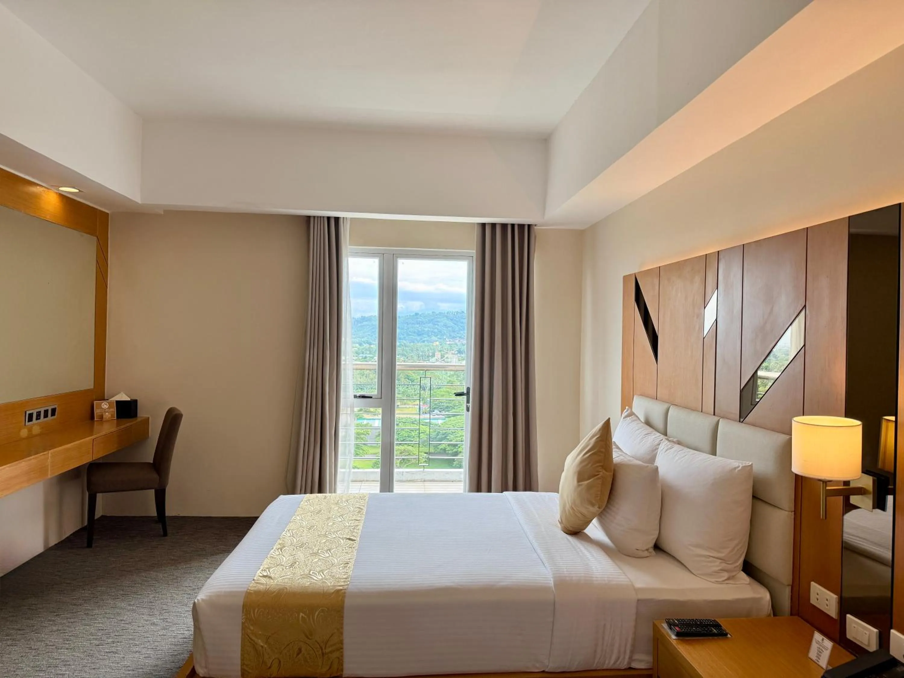 View (from property/room), Bed in Sotogrande Davao Hotel