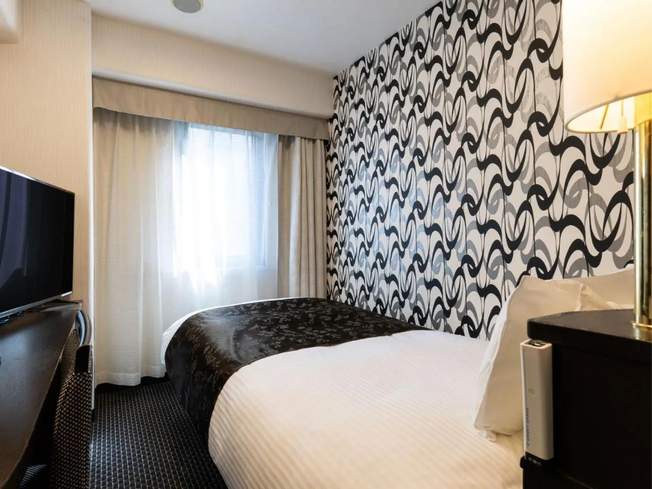 Bed in APA Hotel Nambakita Shinsaibashi Ekimae