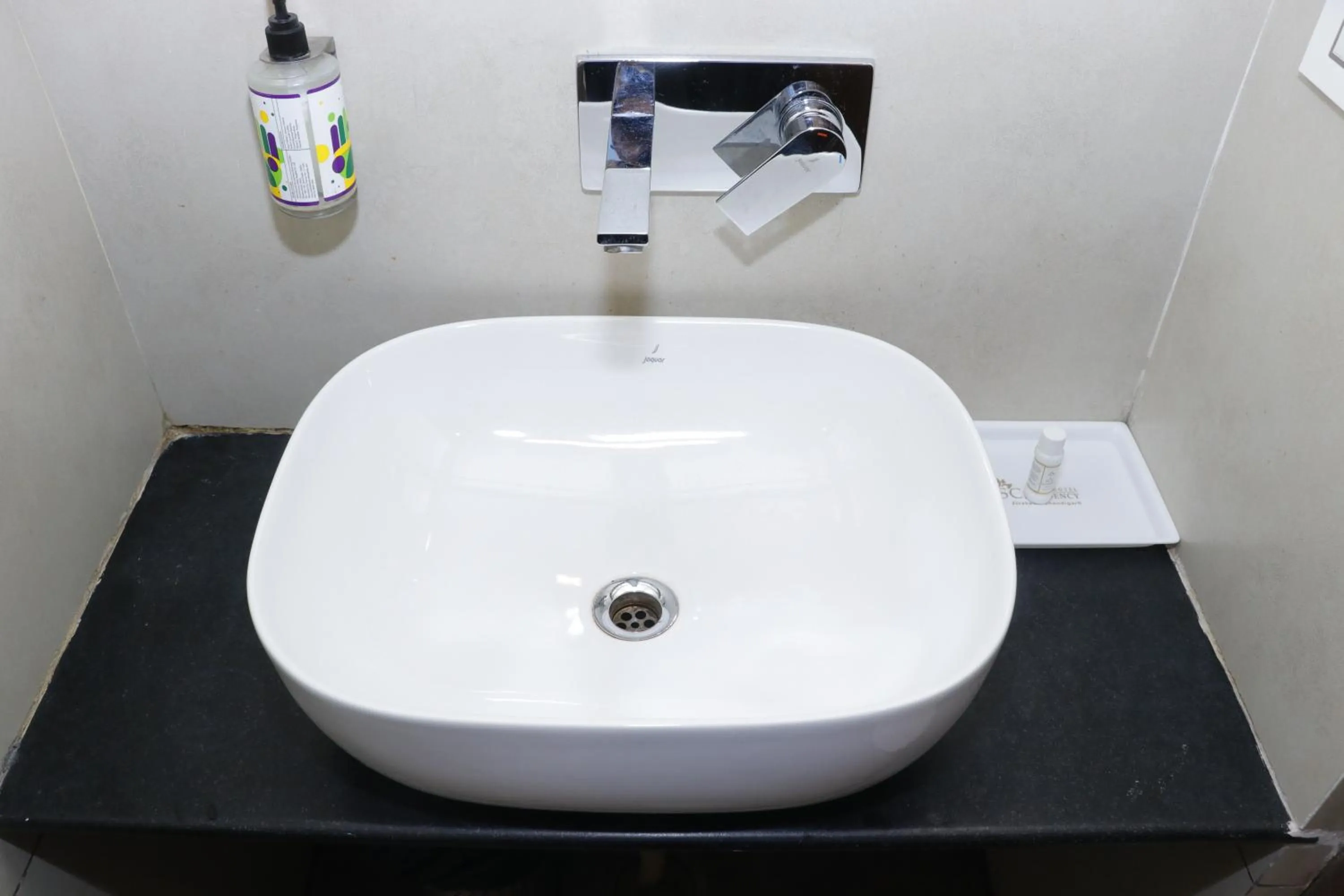 Bathroom in Hotel S C Residency