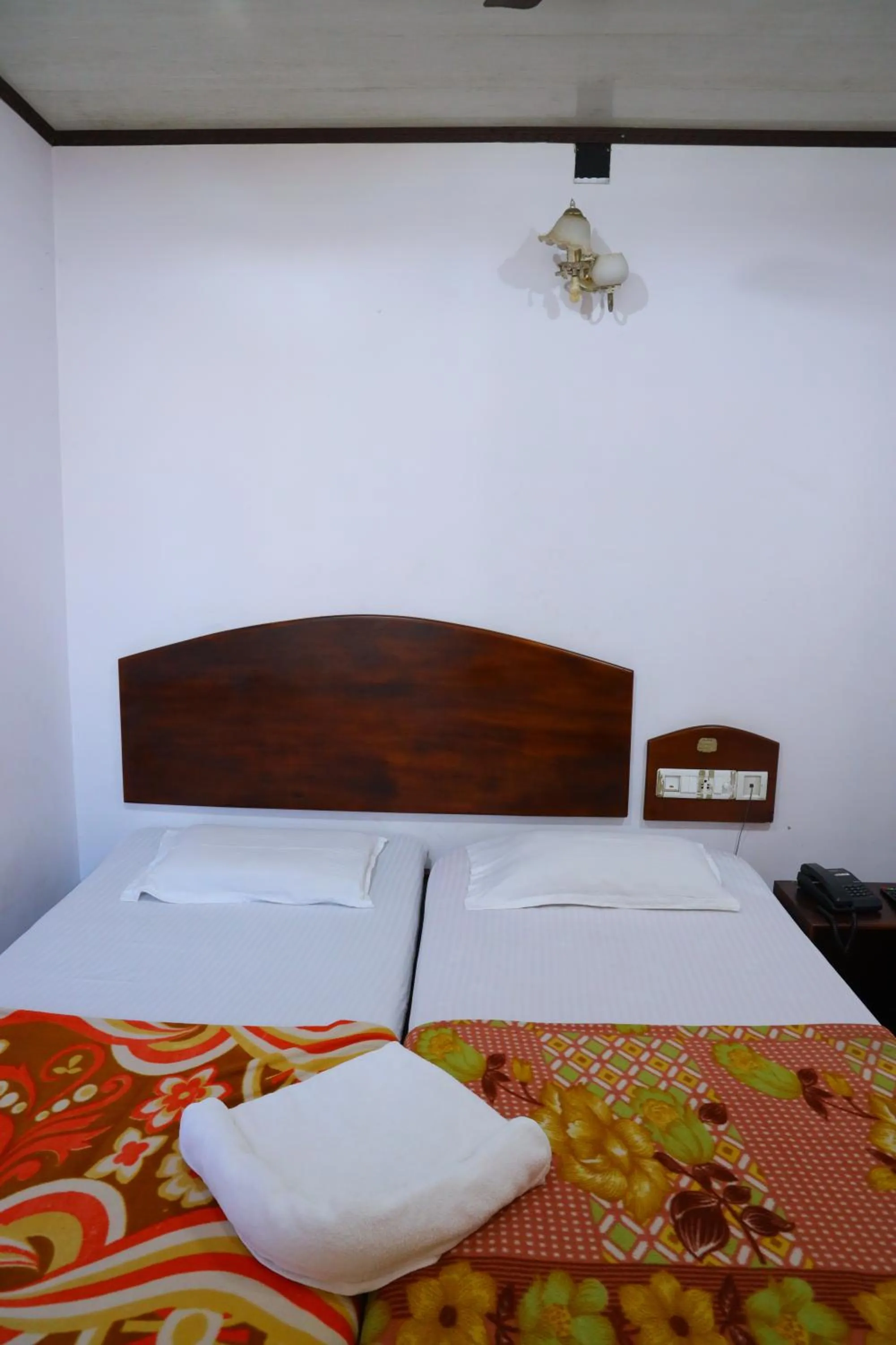 Bedroom, Bed in Ramanilayam Tourist Home