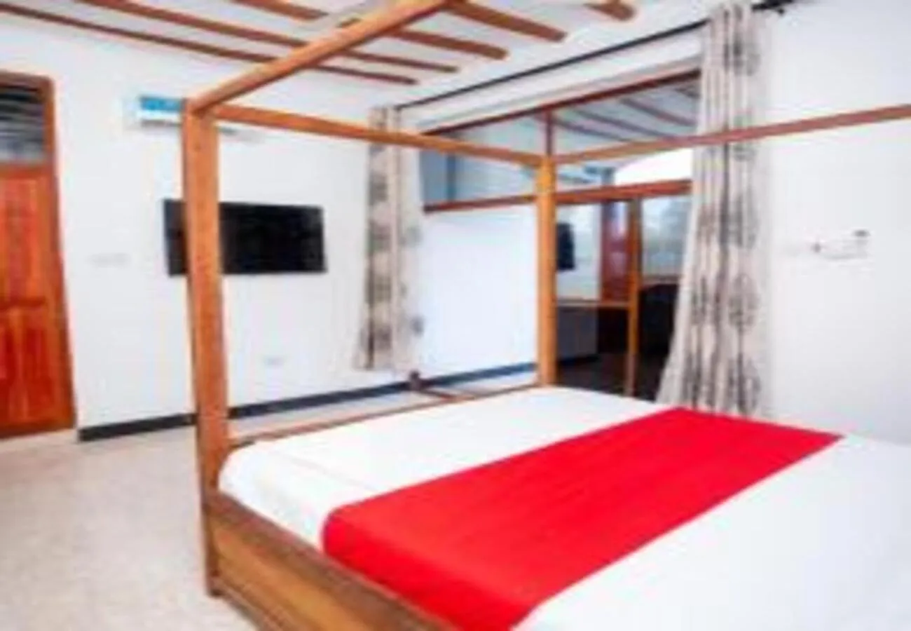 Bed in Utulivu Bungalow