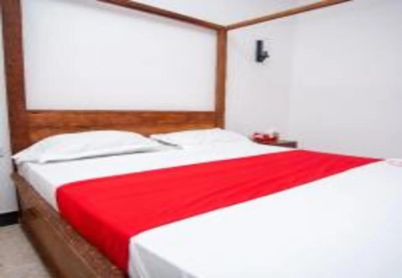 Bed in Utulivu Bungalow