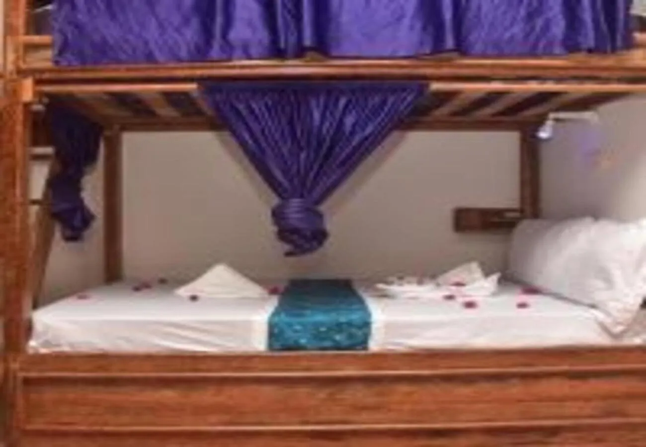 Bed in Utulivu Bungalow