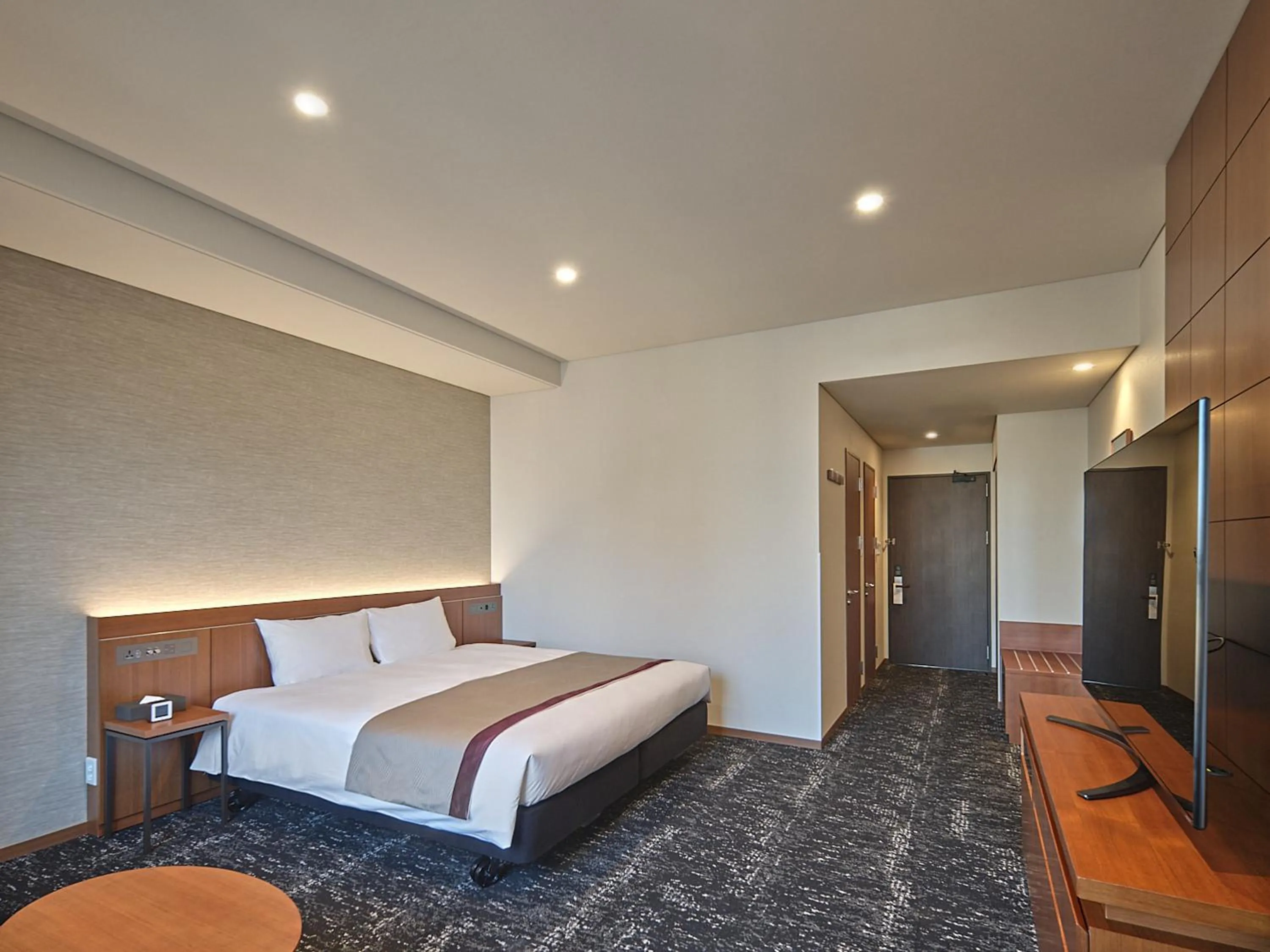 Bed in Roynet Hotel Seoul Mapo