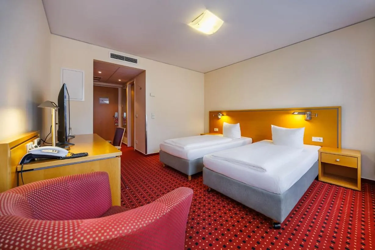 Photo of the whole room, Bed in Airporthotel Berlin-Adlershof