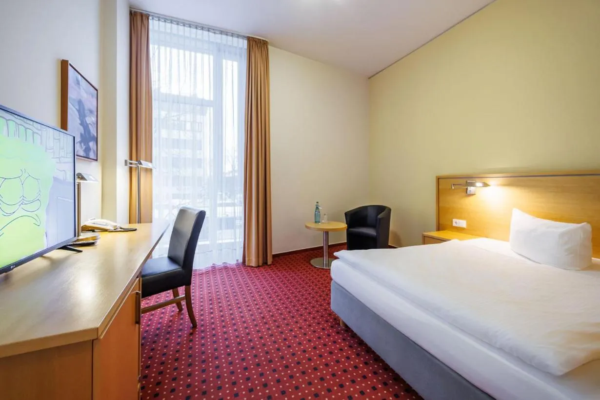 Photo of the whole room, Bed in Airporthotel Berlin-Adlershof