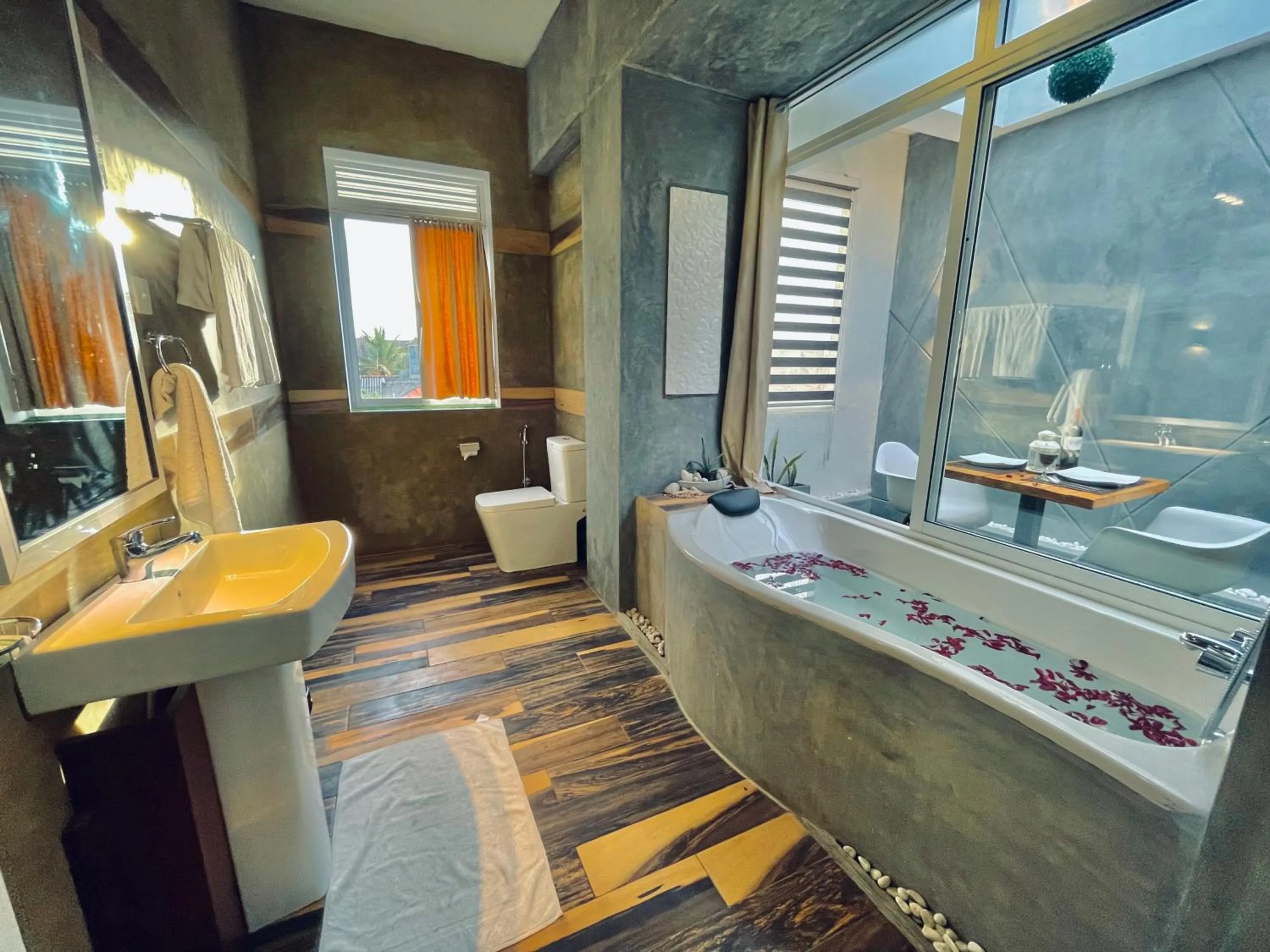 Bathroom in 8 Plus Motels