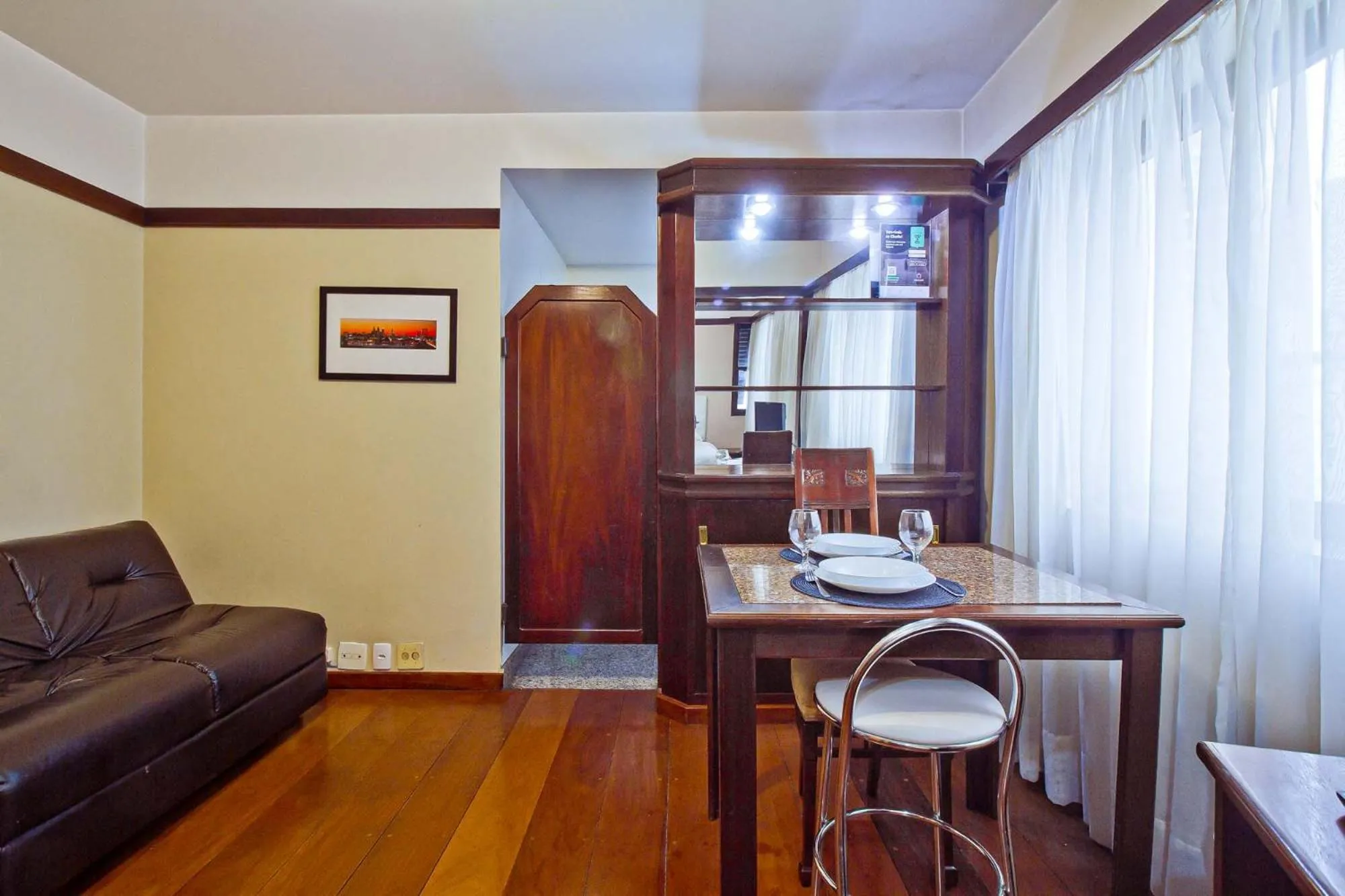 Living room in NewCiti Itaim by Charlie