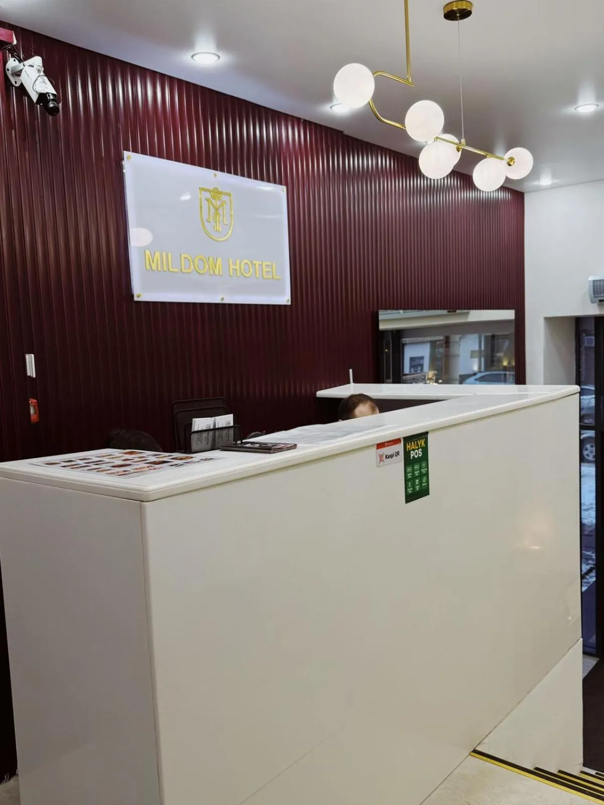 Property logo or sign in Mildom Hotel