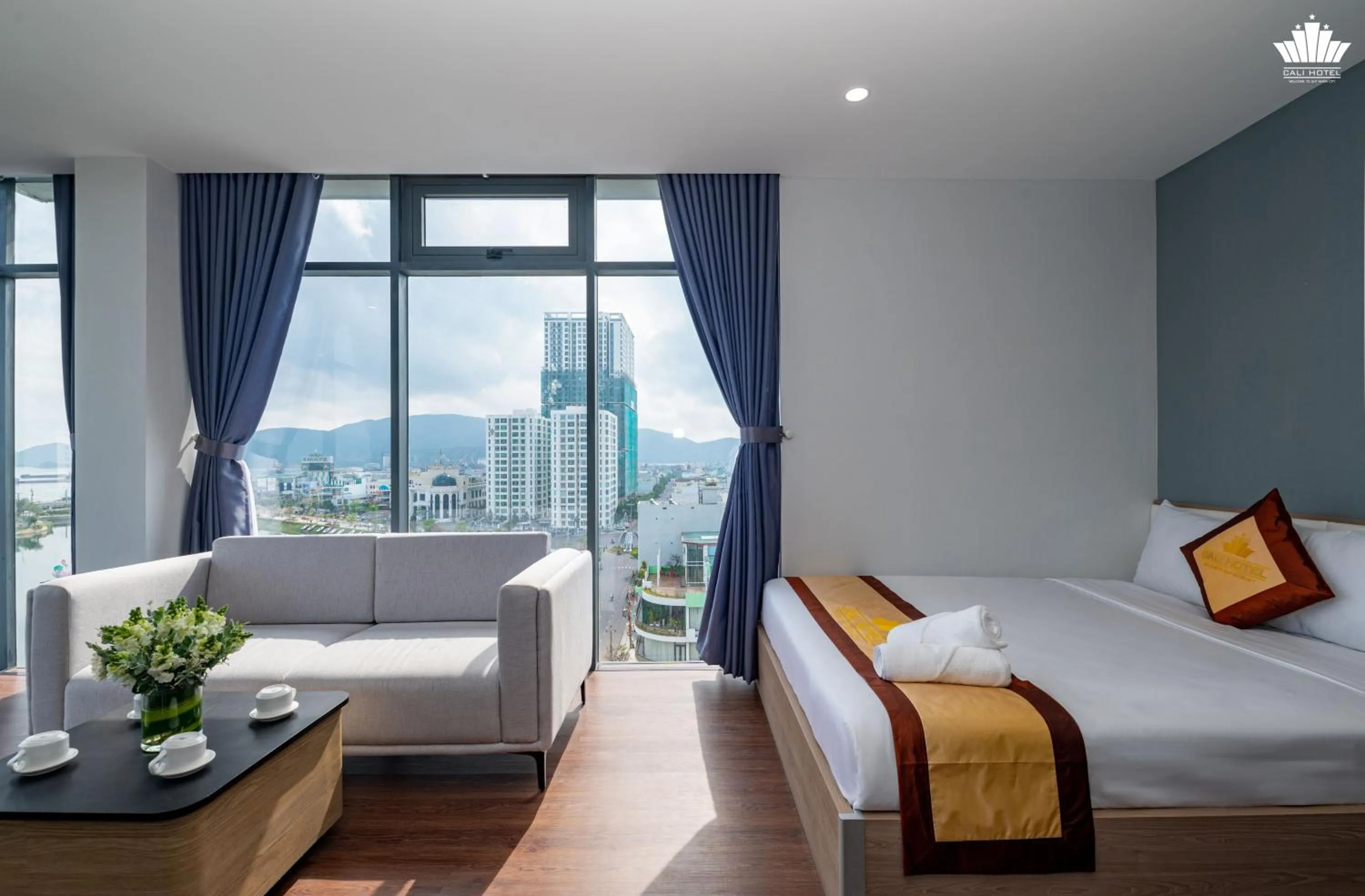 Living room, Bed in Cali Hotel Quy Nhơn