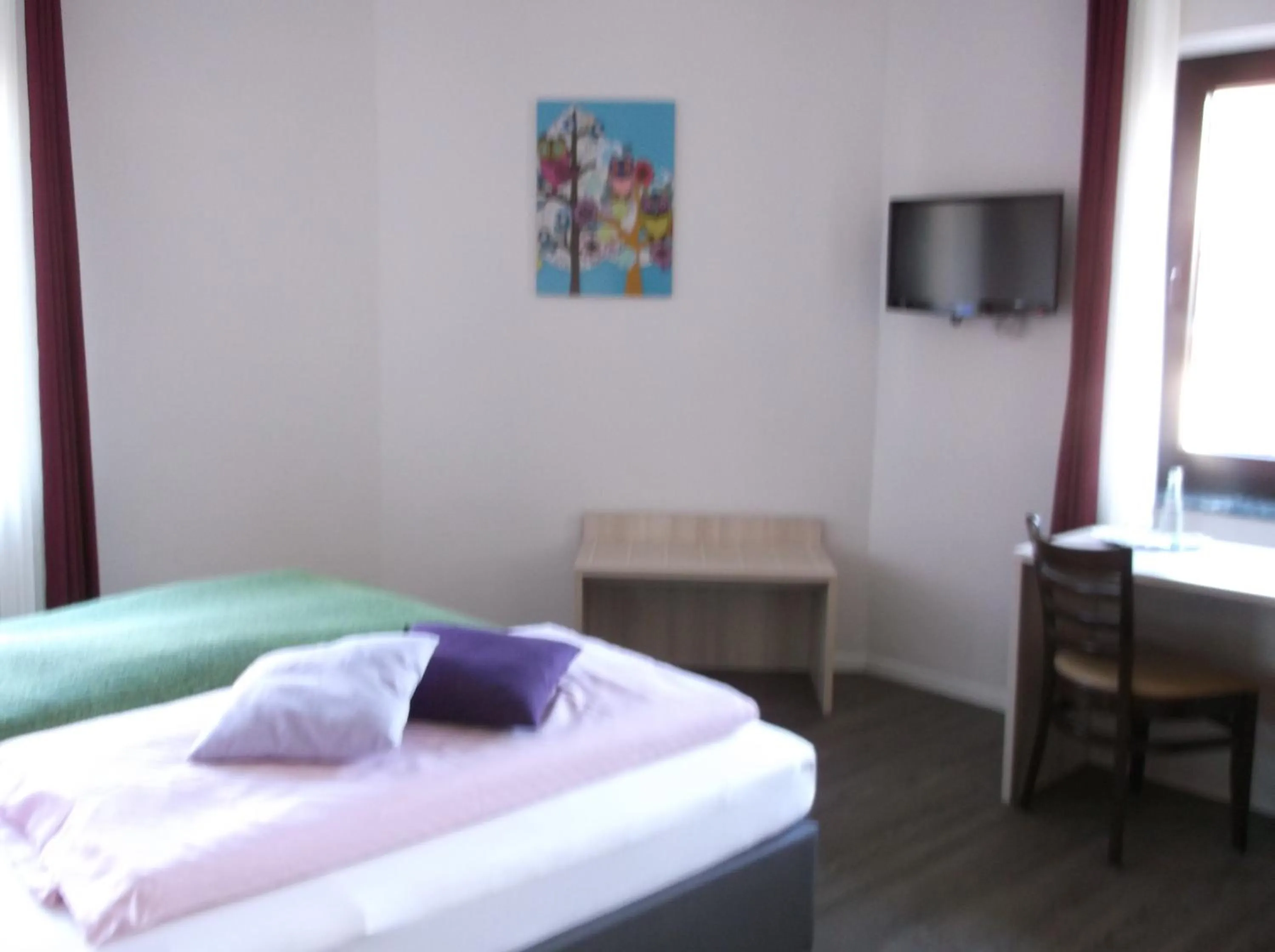 Bed in Hotel Deitmer