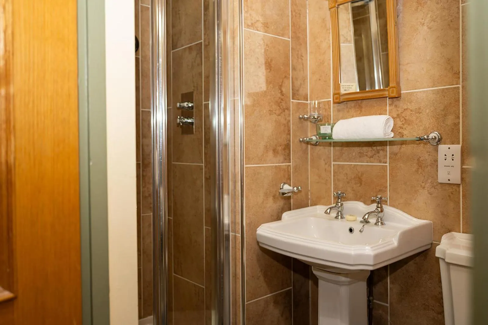 Shower in Tottington Manor Hotel