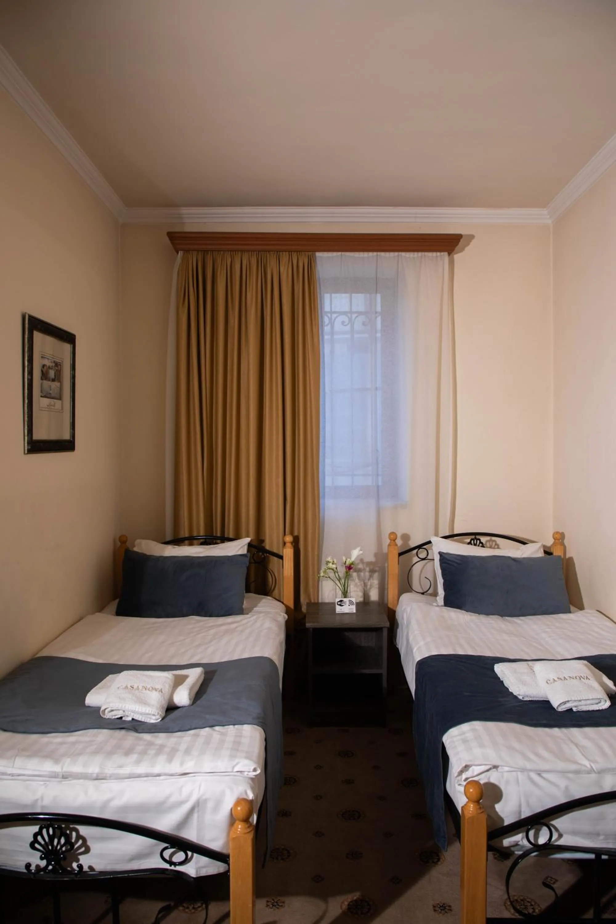 Bed in Casanova Inn - Boutique Hotel