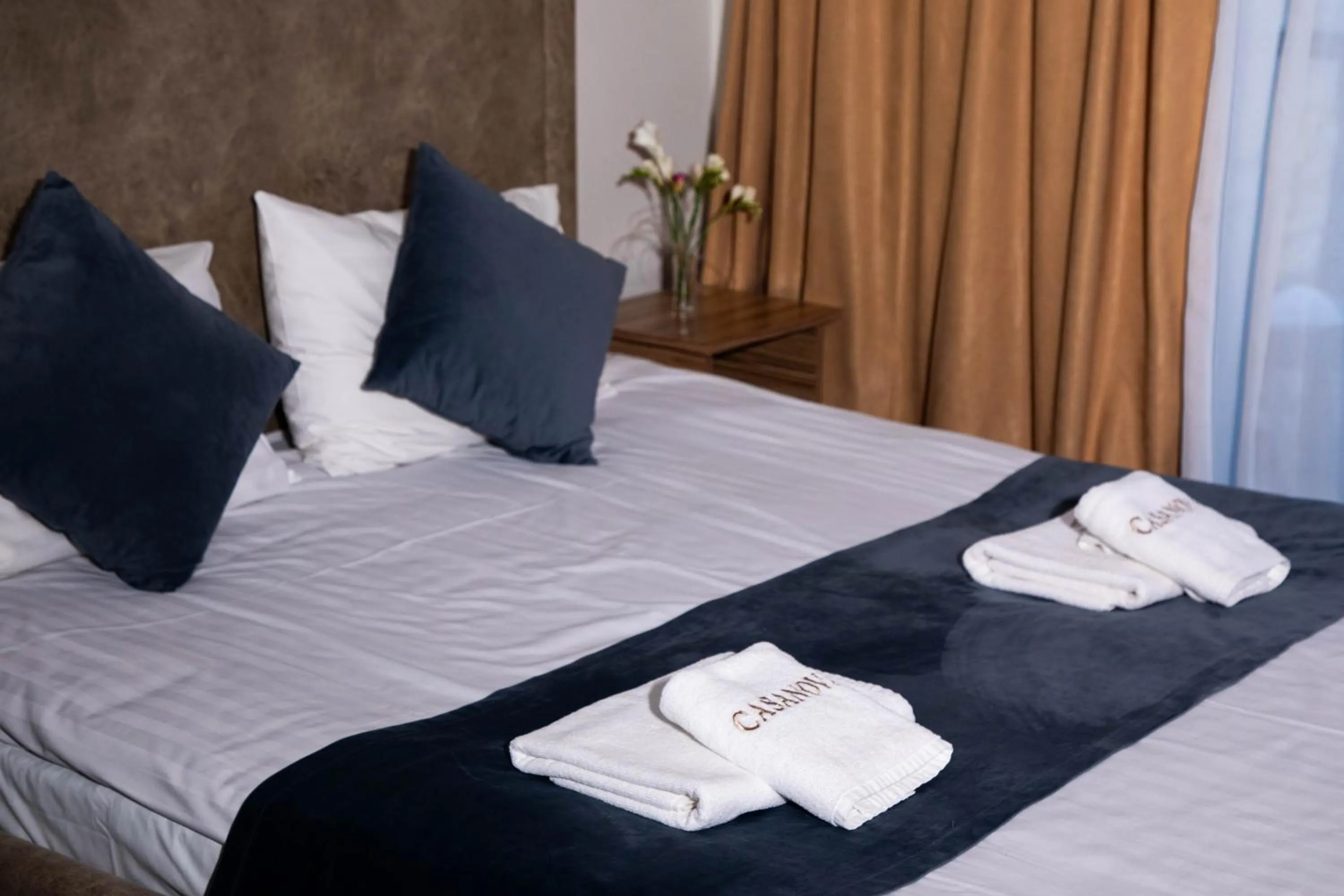 Bed in Casanova Inn - Boutique Hotel