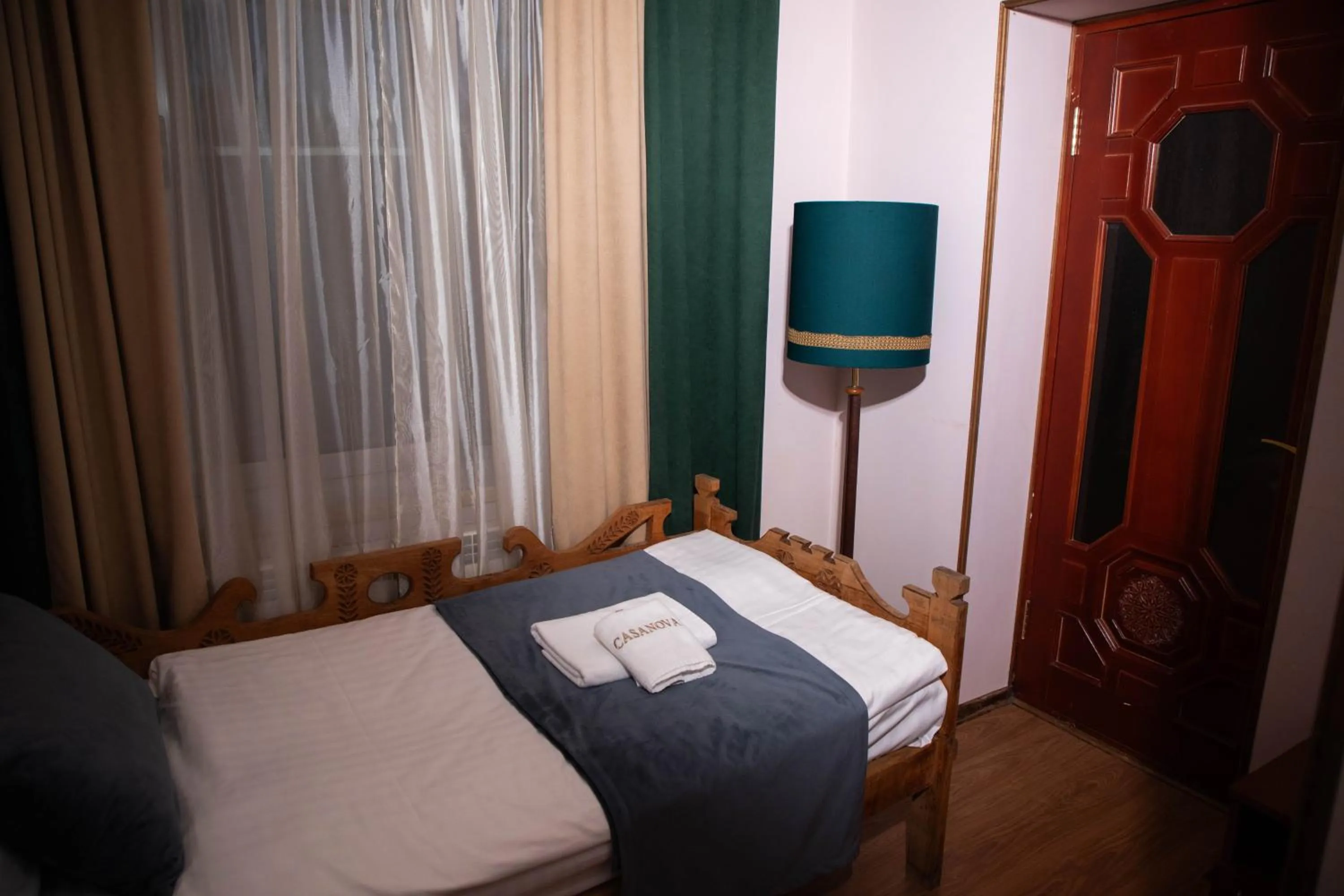 Bed in Casanova Inn - Boutique Hotel