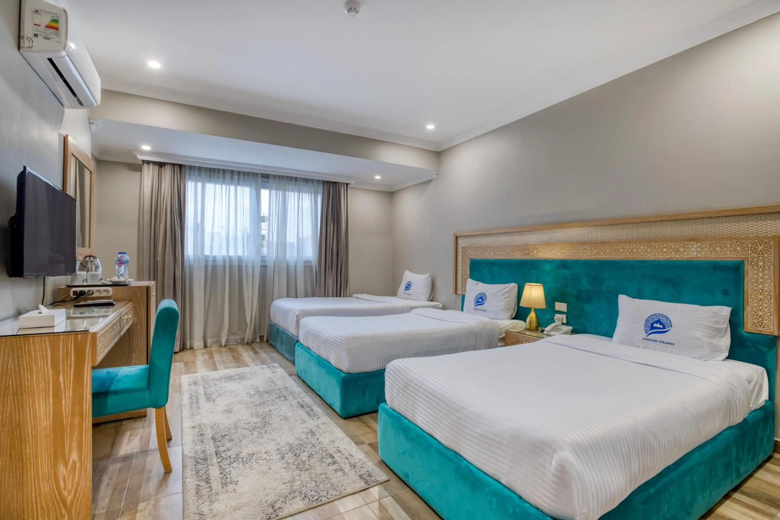 Bed in Mamlouk Pyramids Hotel