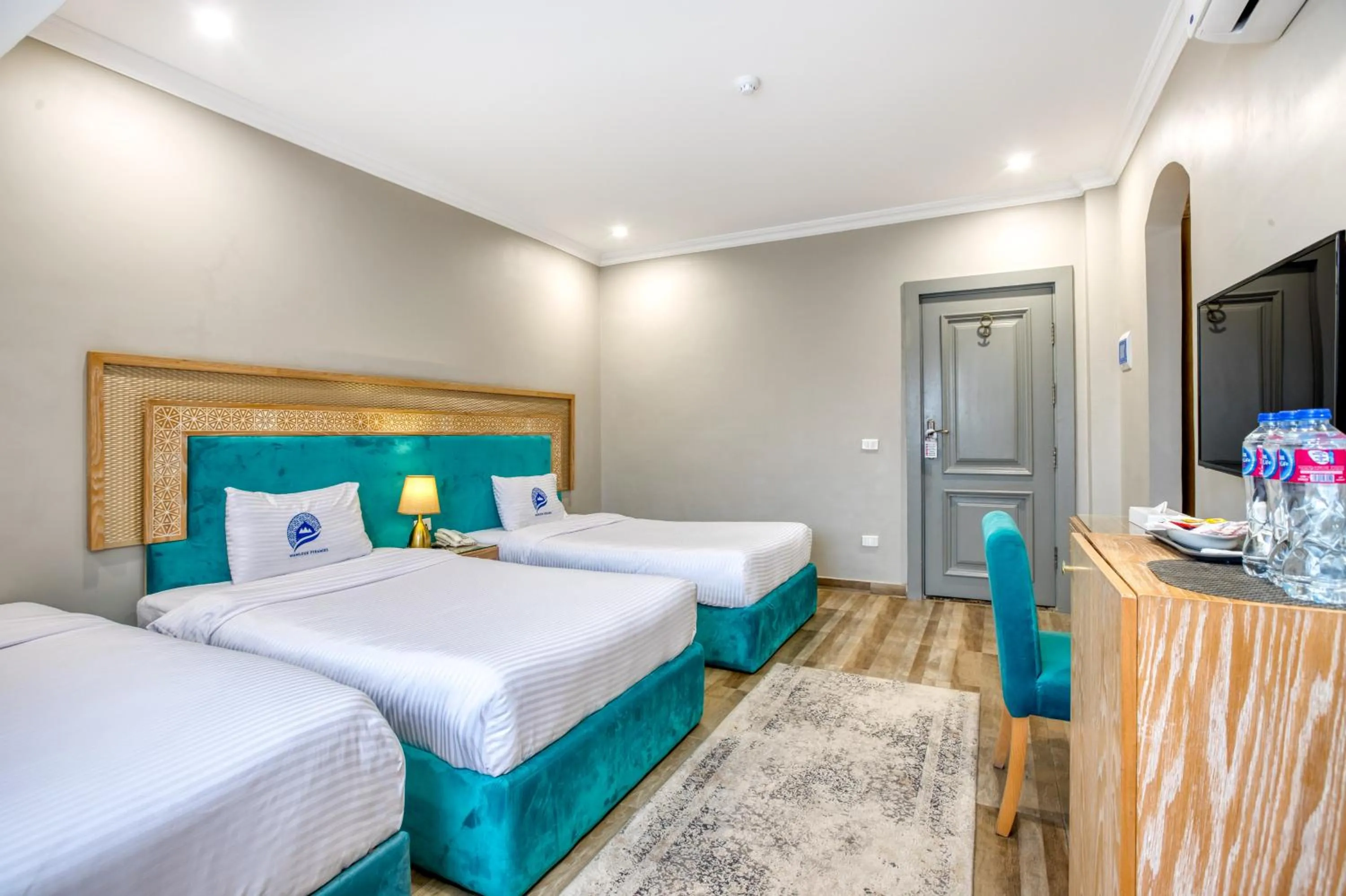 Bed in Mamlouk Pyramids Hotel