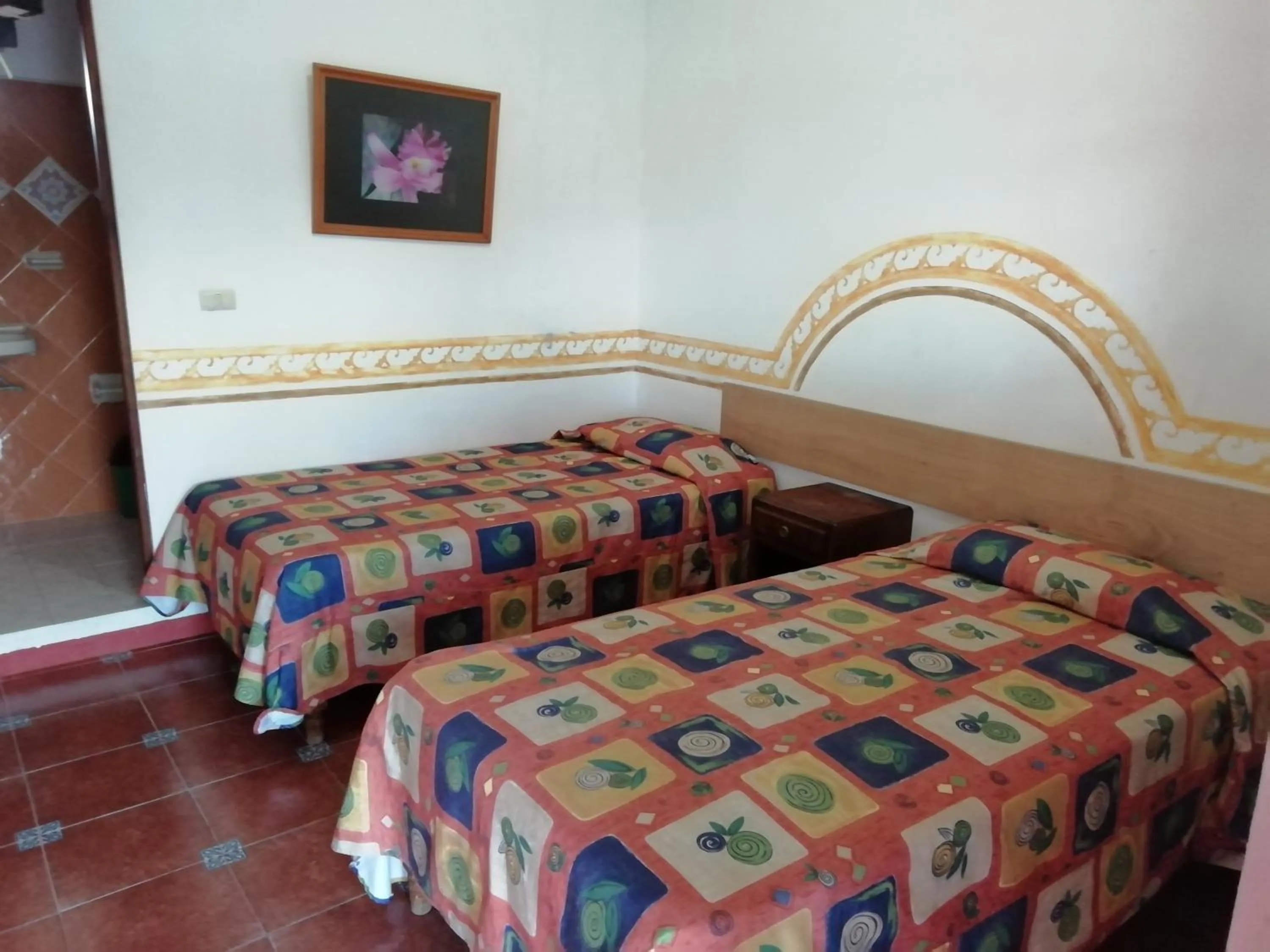 Bed in Posada Los Naranjos