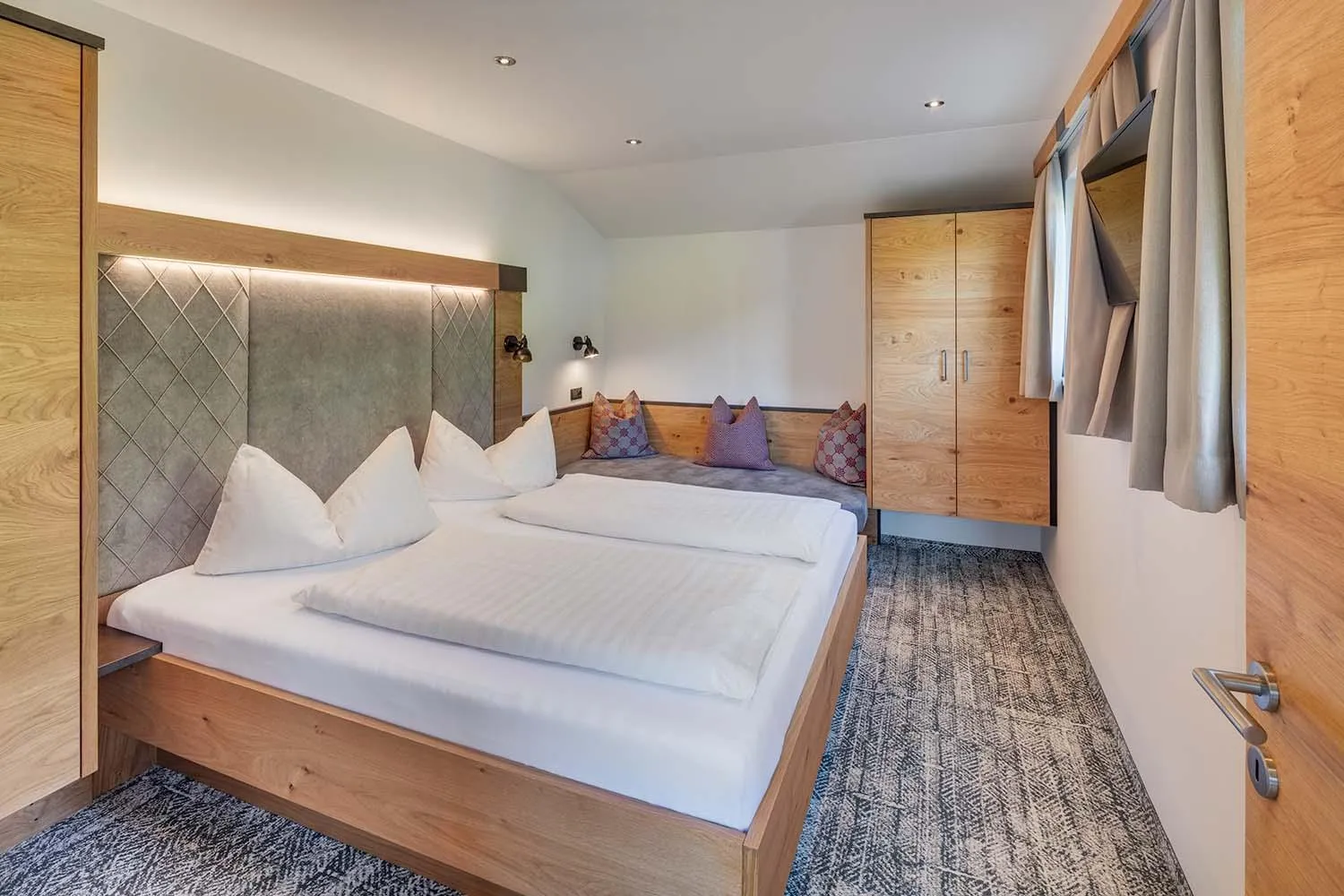 Bed in Apparthotel Talhof, Restaurant, Pool und Spa