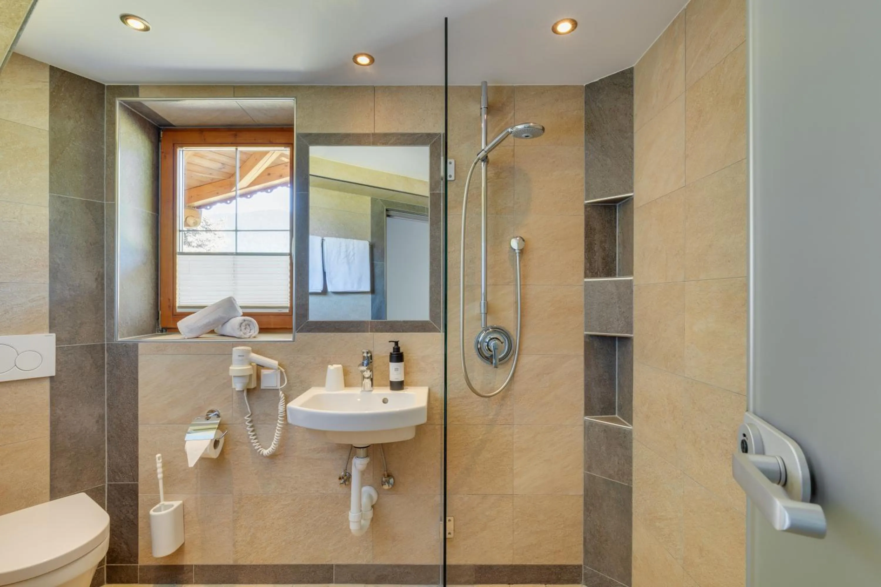 Bathroom in Apparthotel Talhof, Restaurant, Pool und Spa