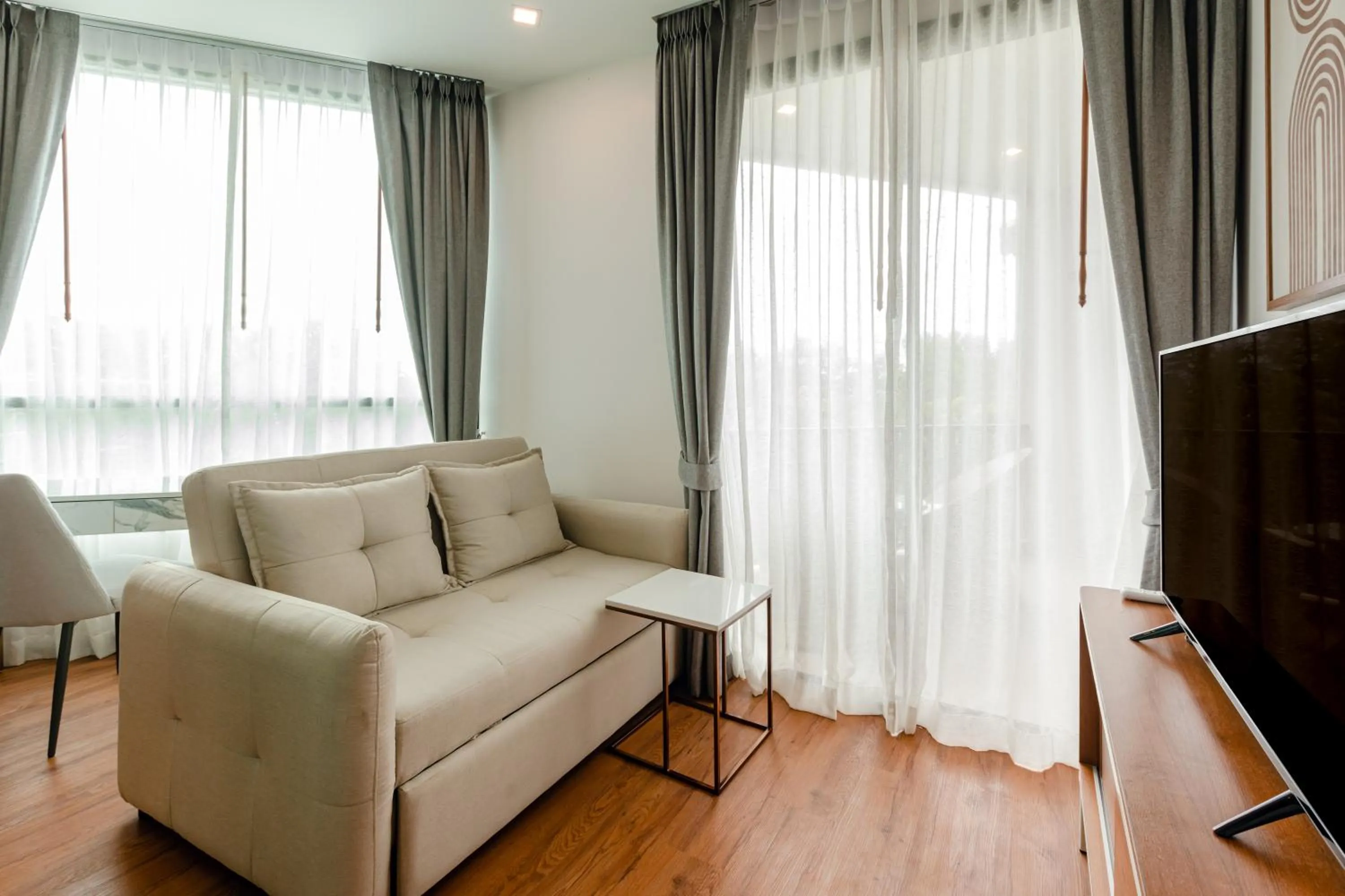 Living room in The Proud Rawai Resort