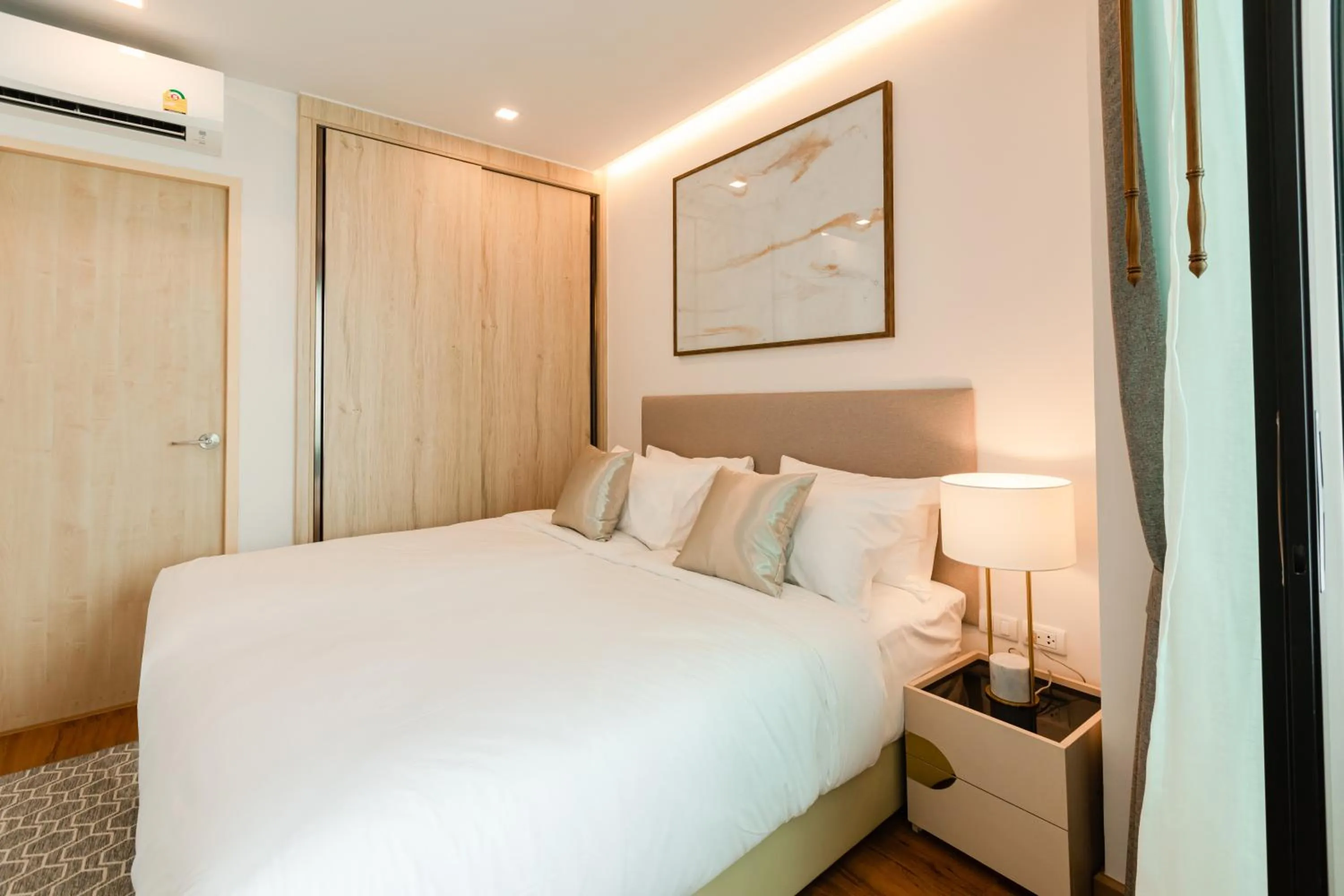 Bedroom, Bed in The Proud Rawai Resort