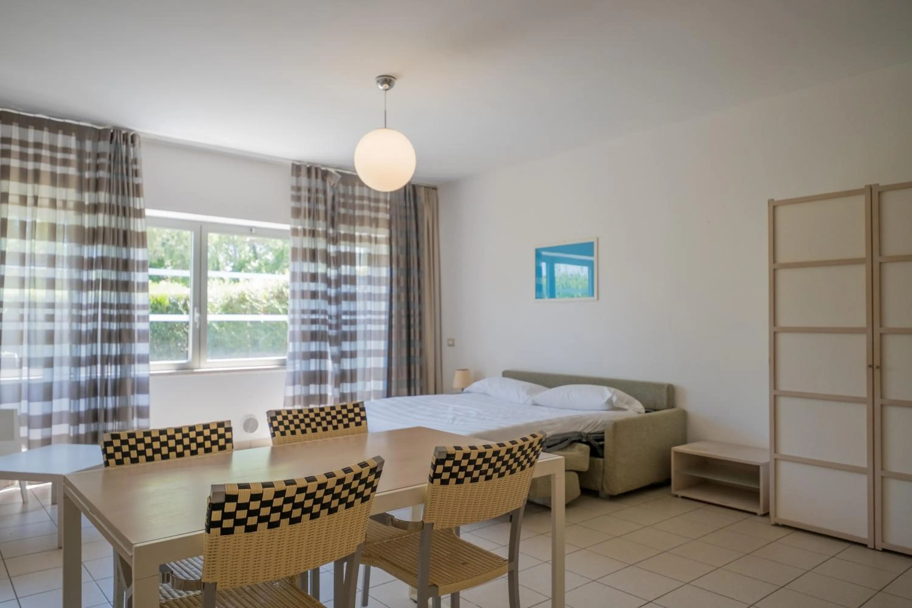Living room, Bed in Solidago Residence