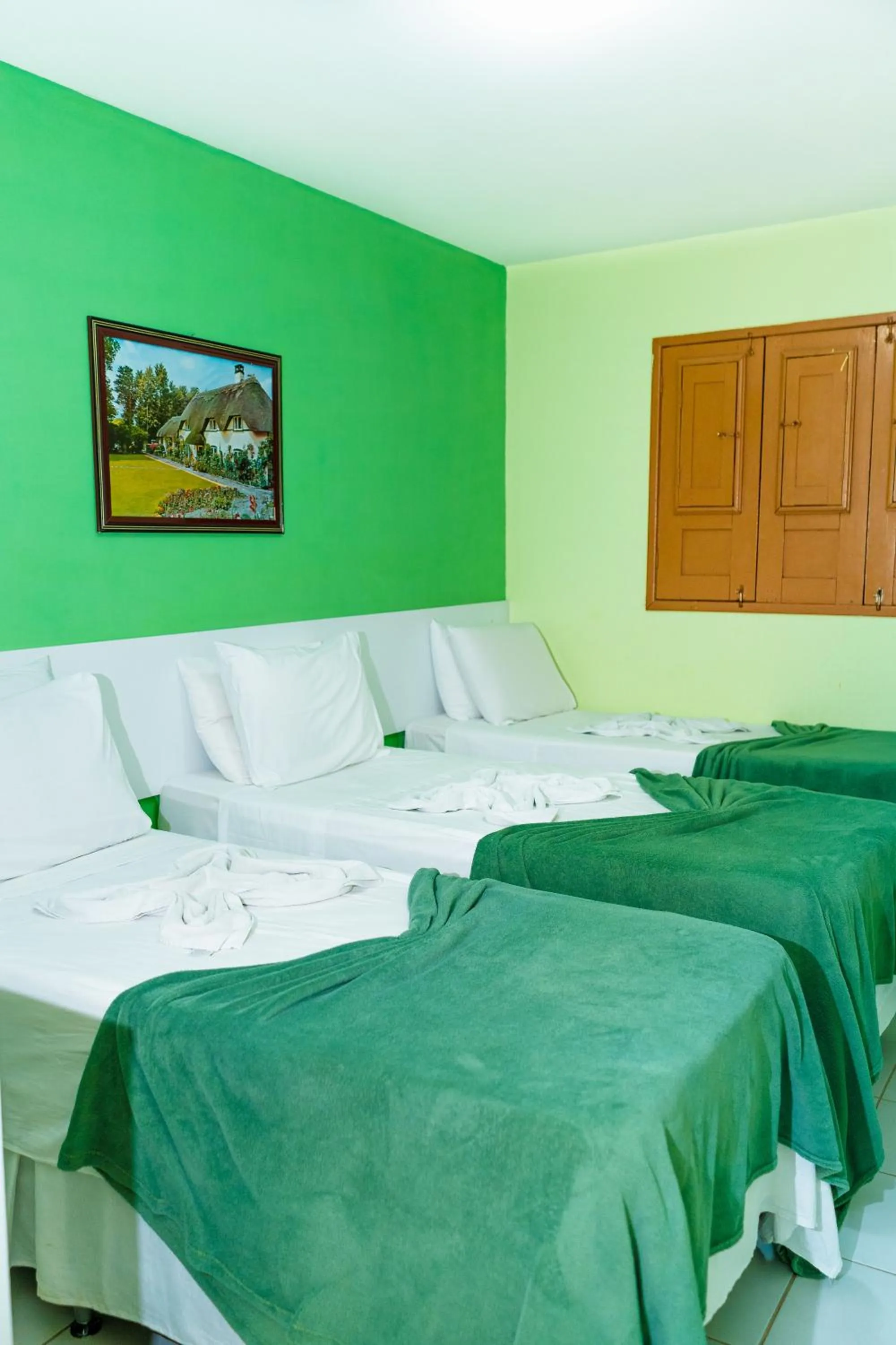 Bed in Pousada Ouriço