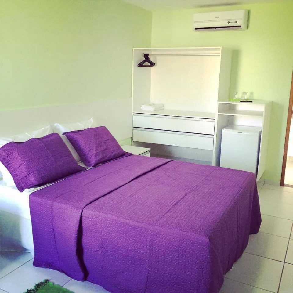 Photo of the whole room, Bed in Pousada Ouriço