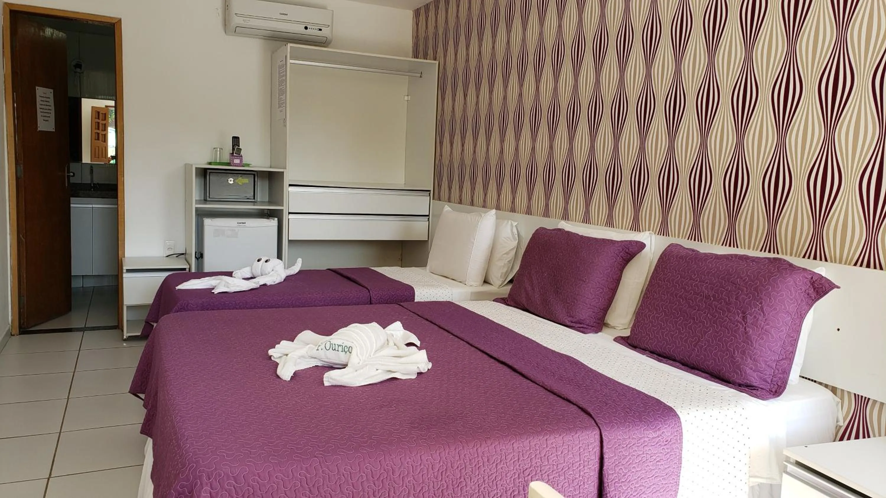 Bed in Pousada Ouriço