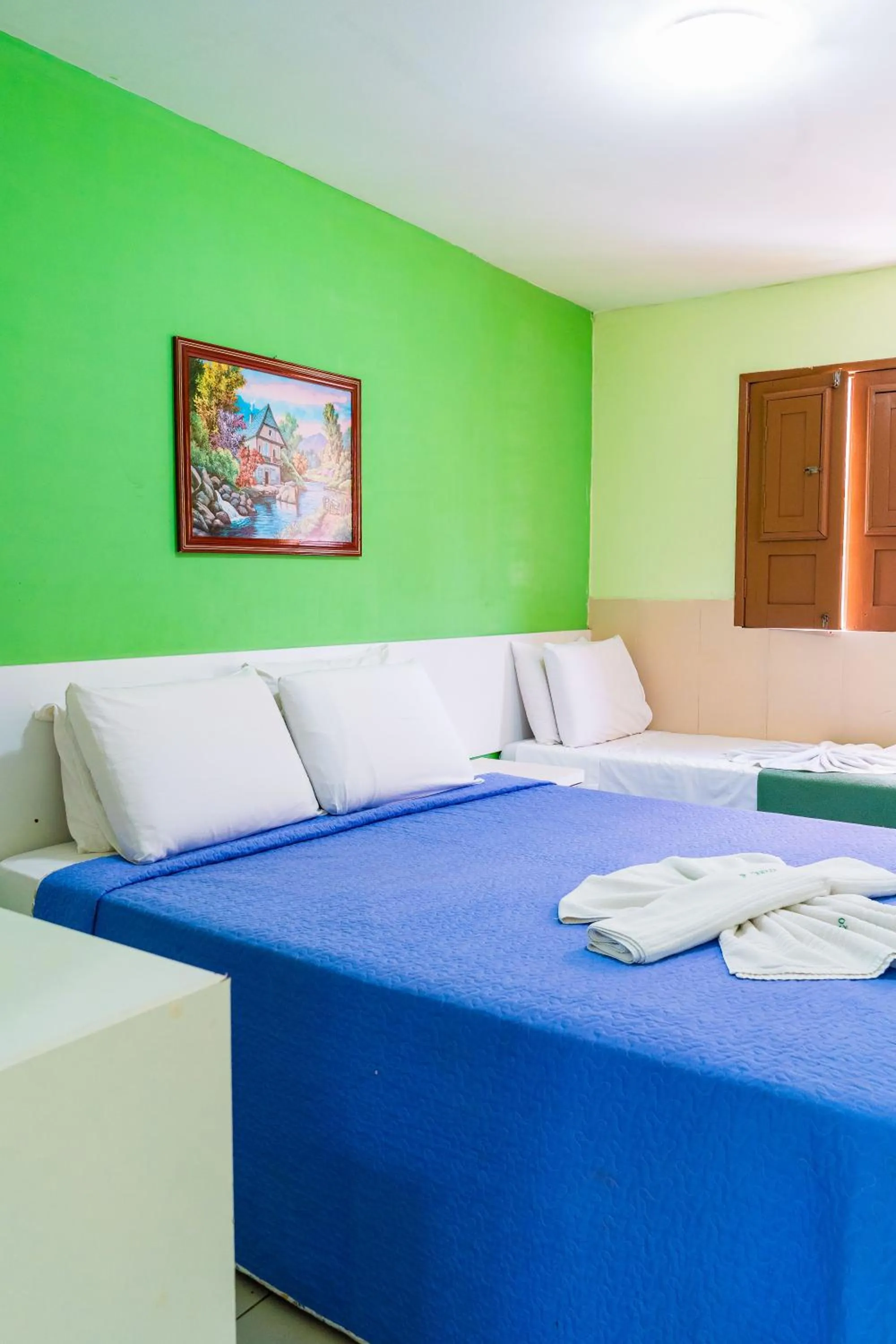 Bed in Pousada Ouriço