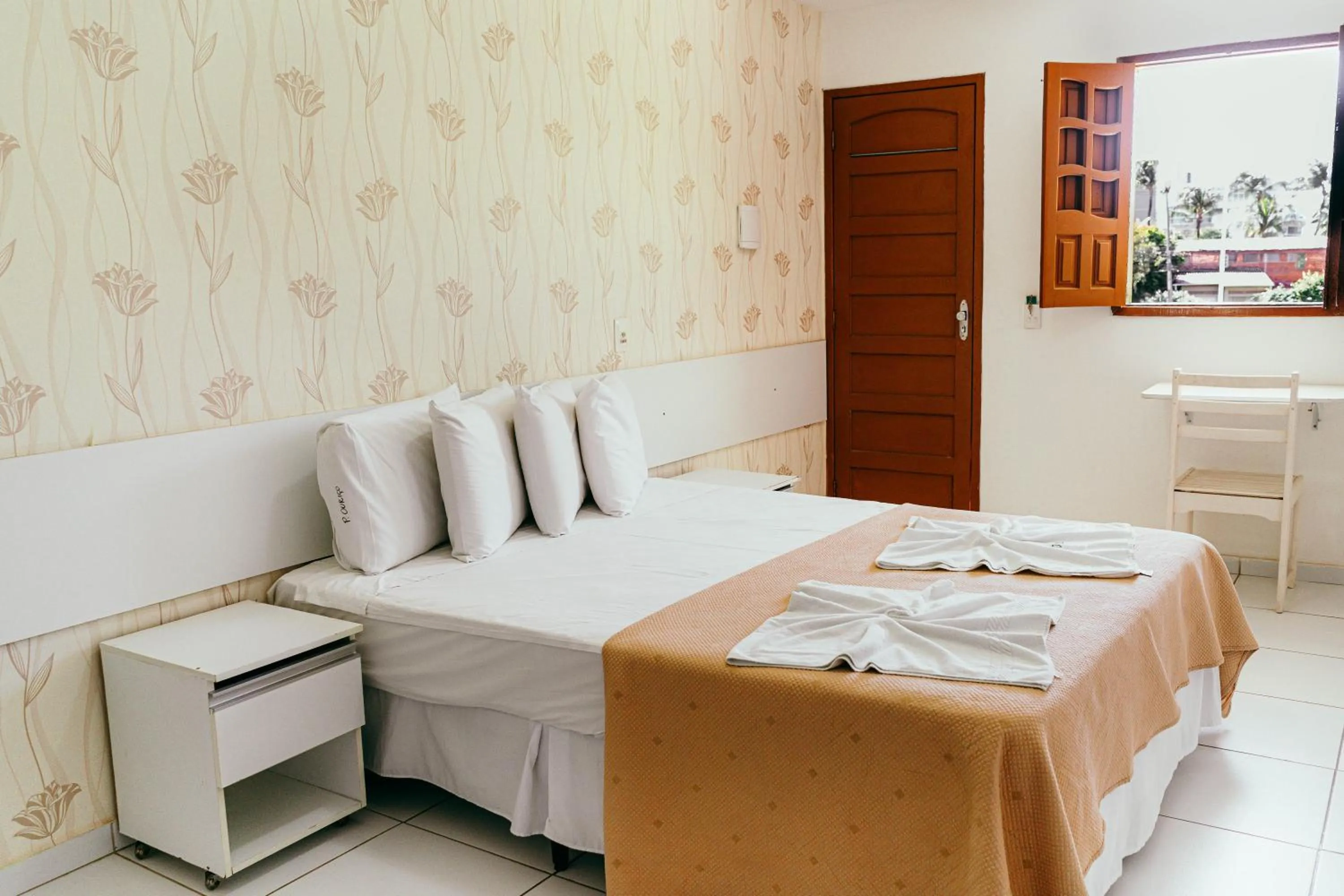 Bed in Pousada Ouriço