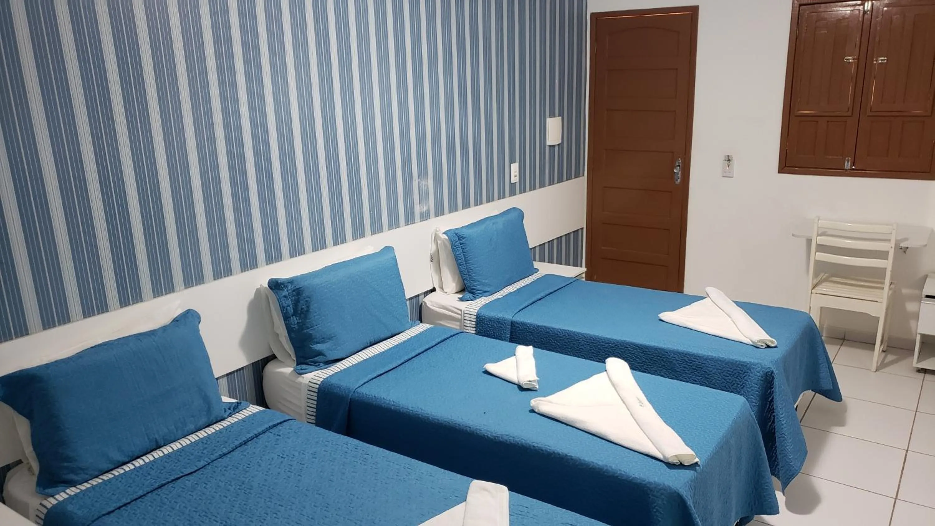 Bed in Pousada Ouriço