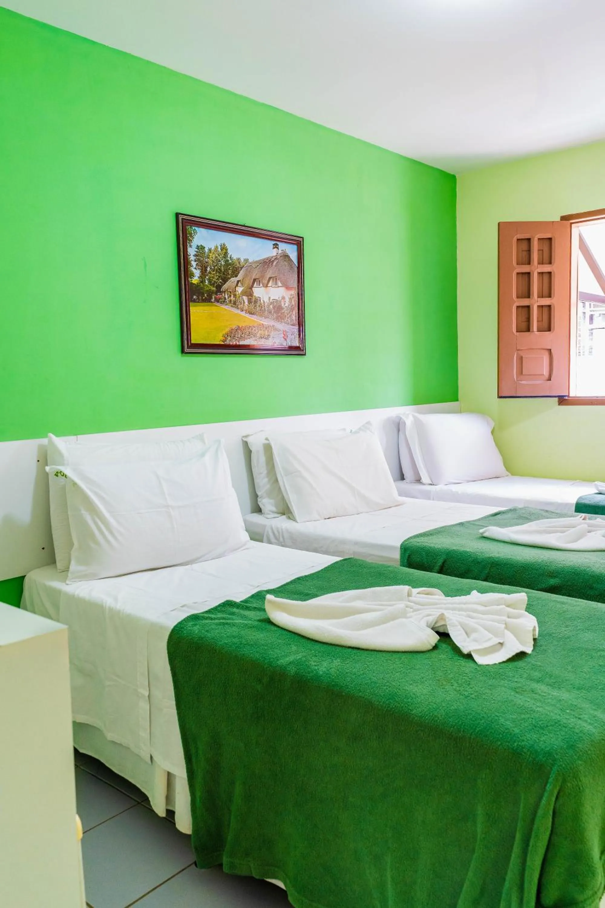 Bed in Pousada Ouriço