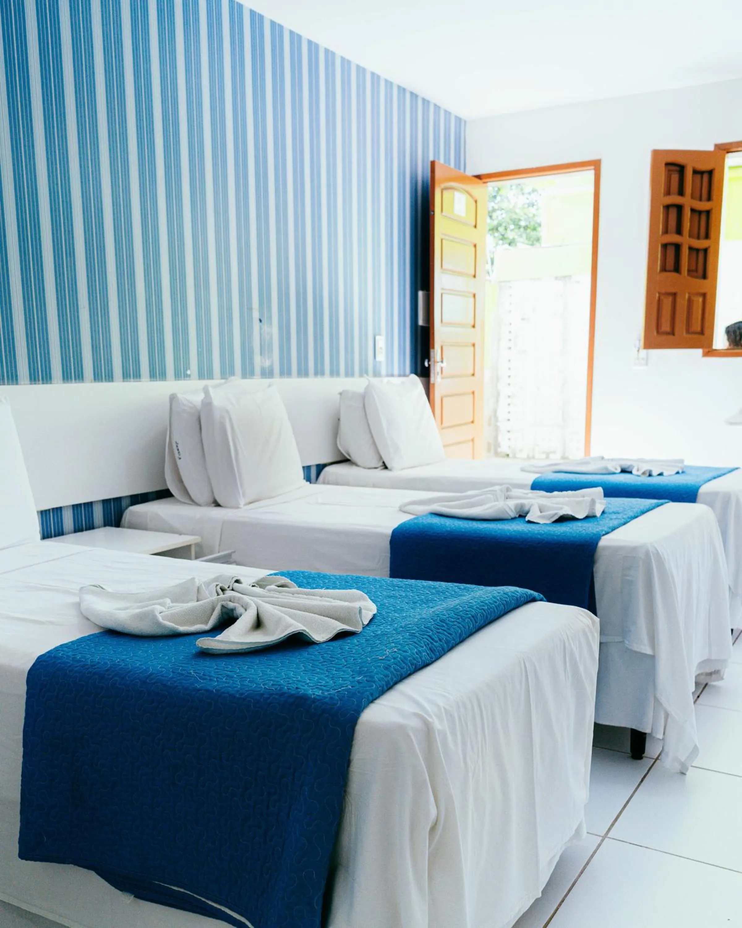 Bed in Pousada Ouriço