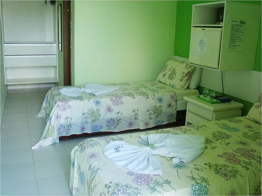 Photo of the whole room, Bed in Pousada Ouriço
