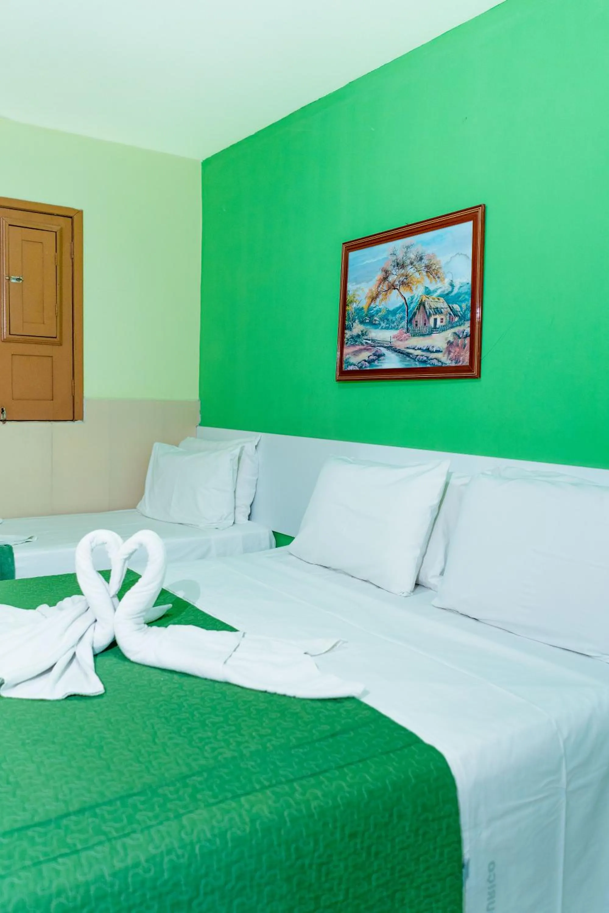 Bed in Pousada Ouriço