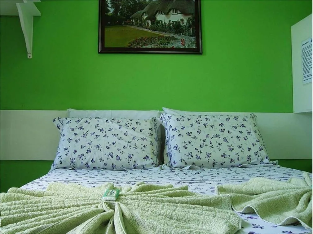 Bed in Pousada Ouriço