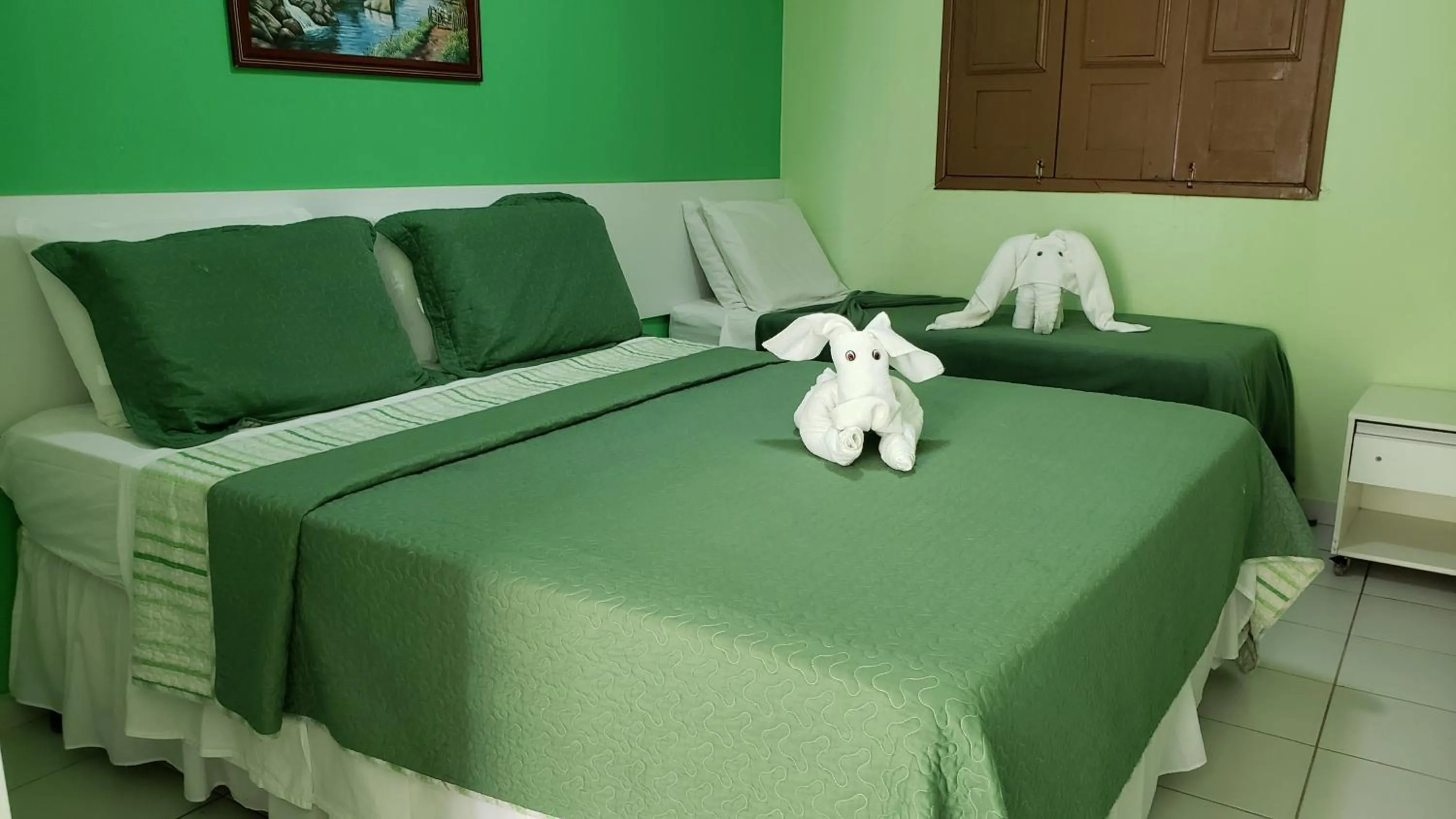 Bed in Pousada Ouriço